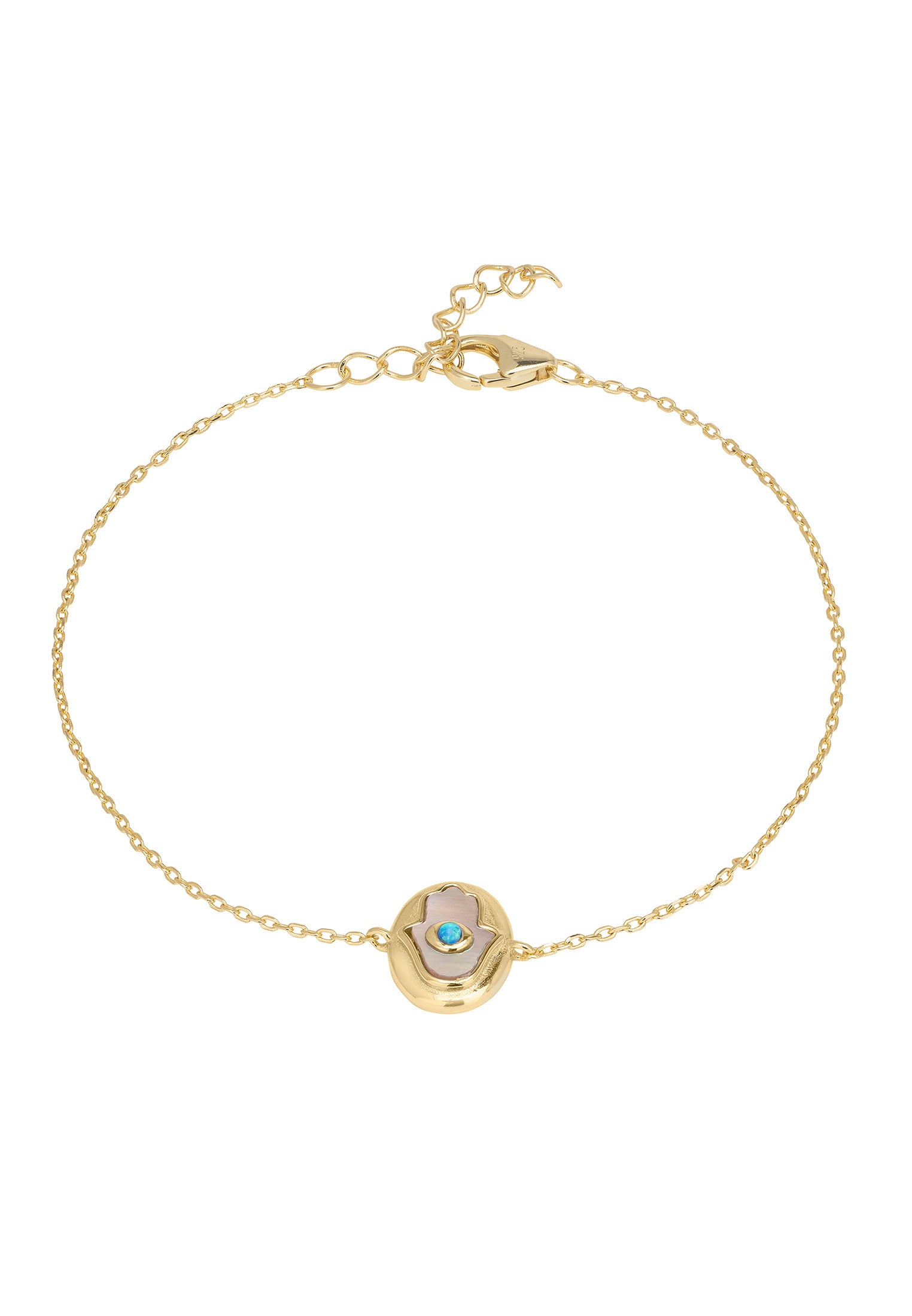 Gold bracelet with a circular charm featuring a blue gemstone on a white background