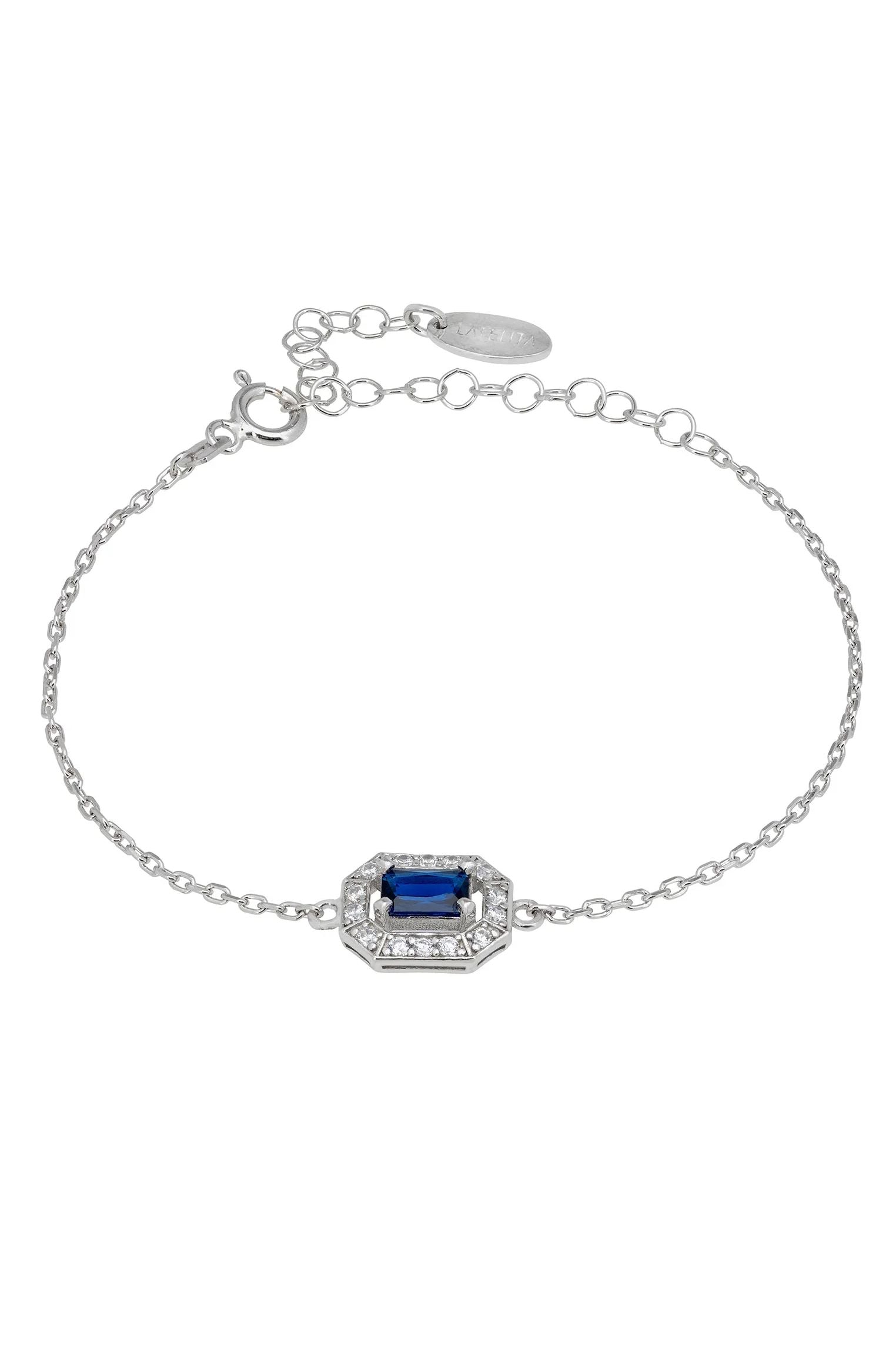 Diamond halo sapphire charm silver bracelet.
