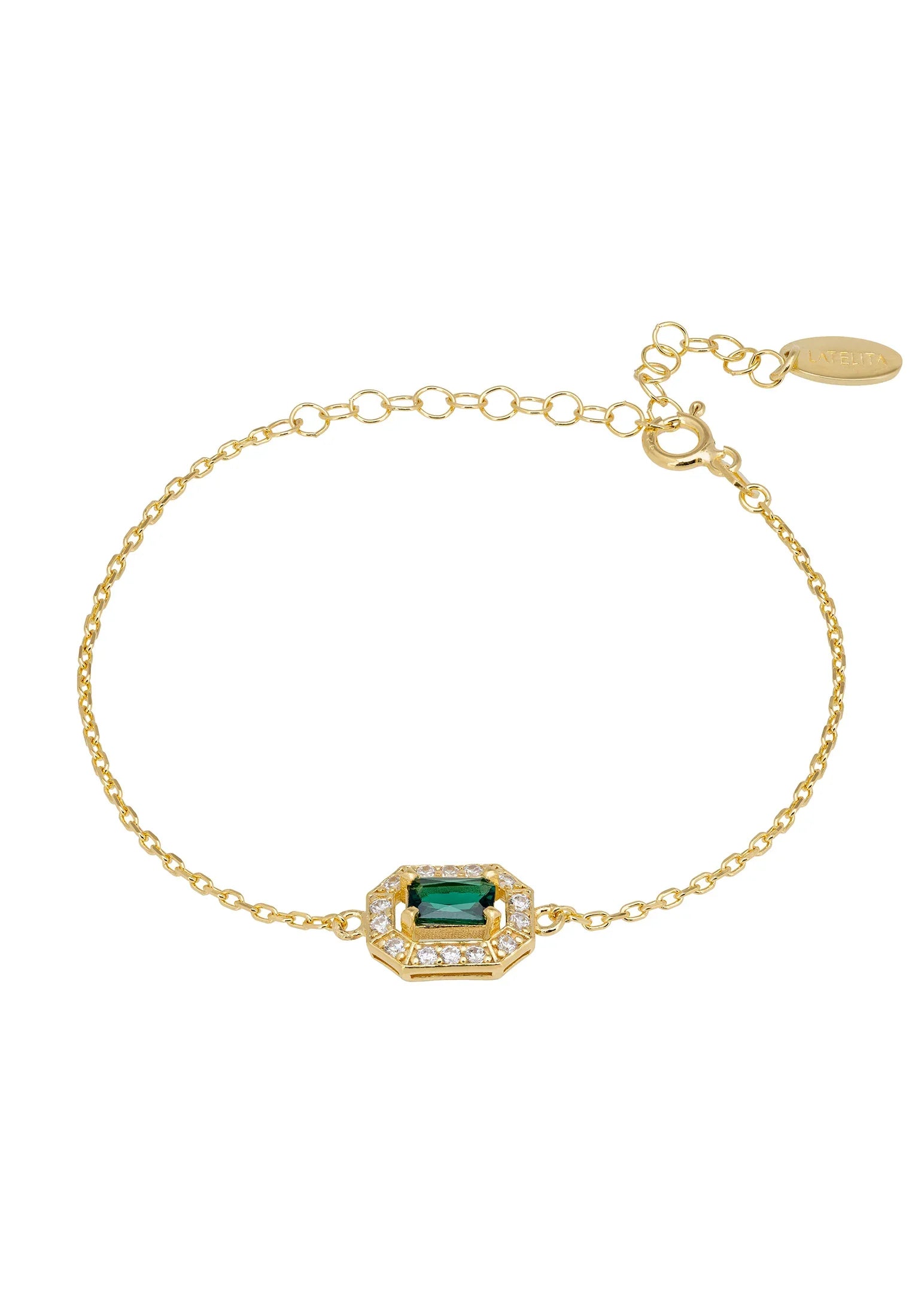 Diamond halo emerald charm gold bracelet.