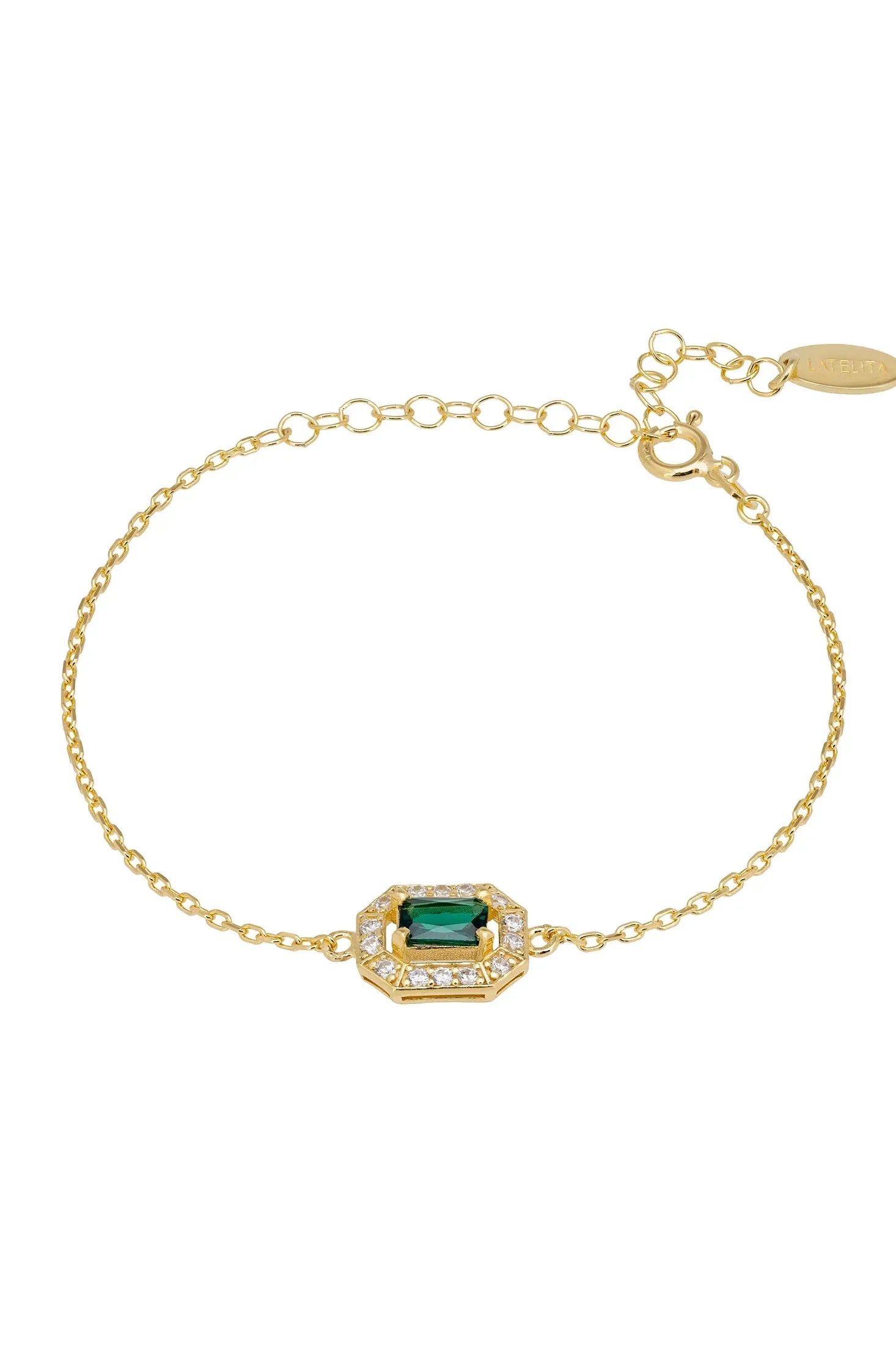 Diamond halo emerald charm gold bracelet.