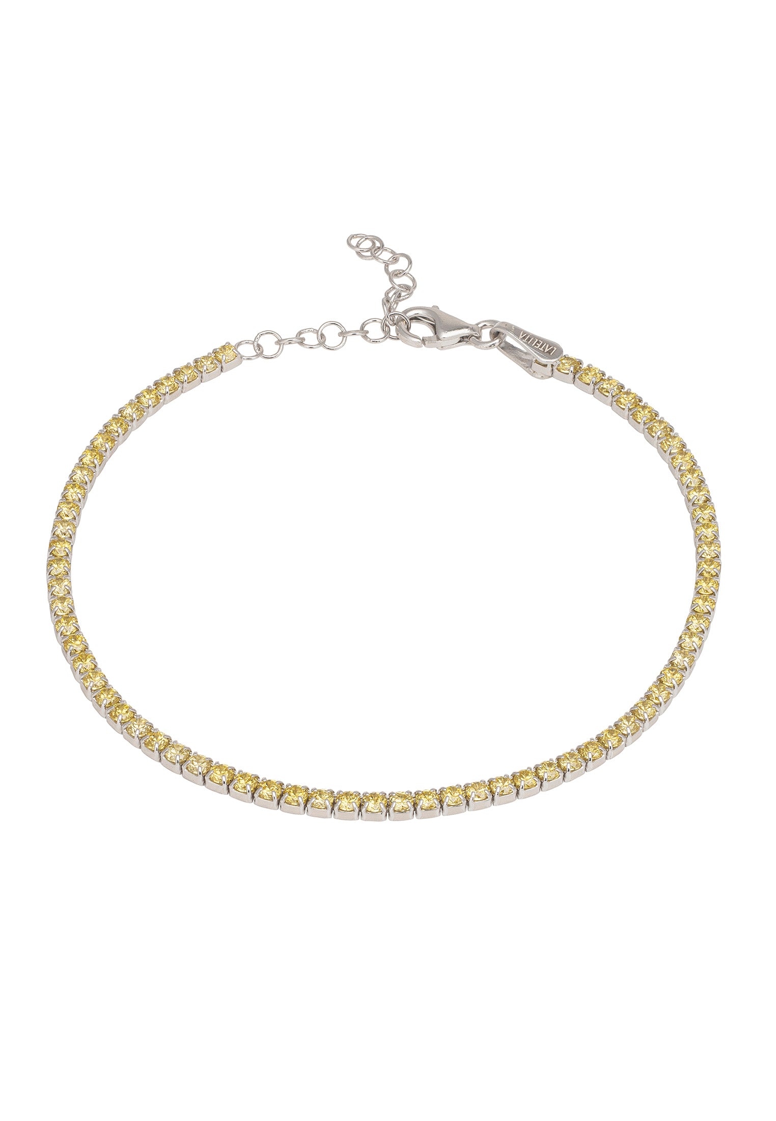 Gold bracelet with yellow stones on a white background