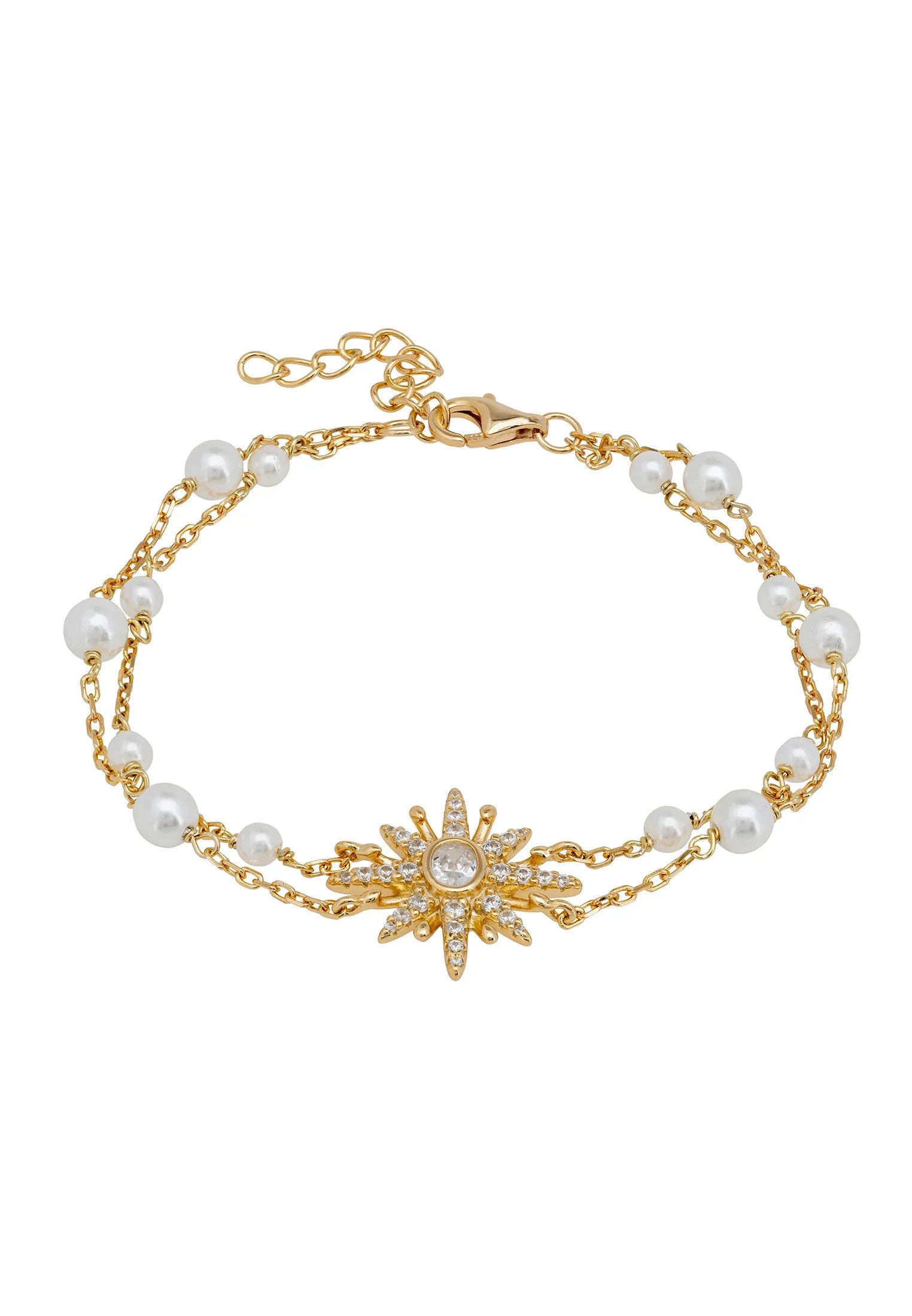 Diamond and gold starburst bracelet with pearls.