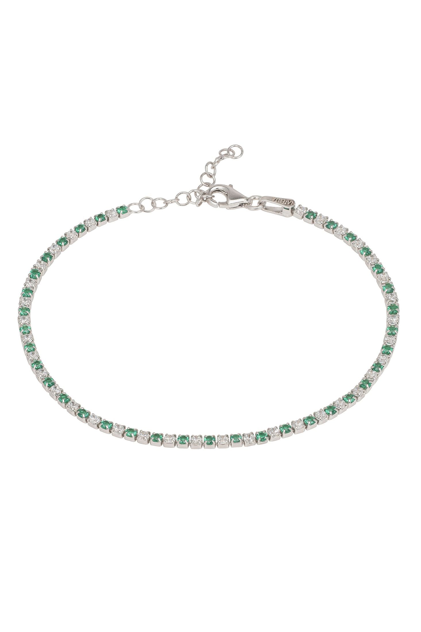 Silver bracelet with green gemstones on a white background