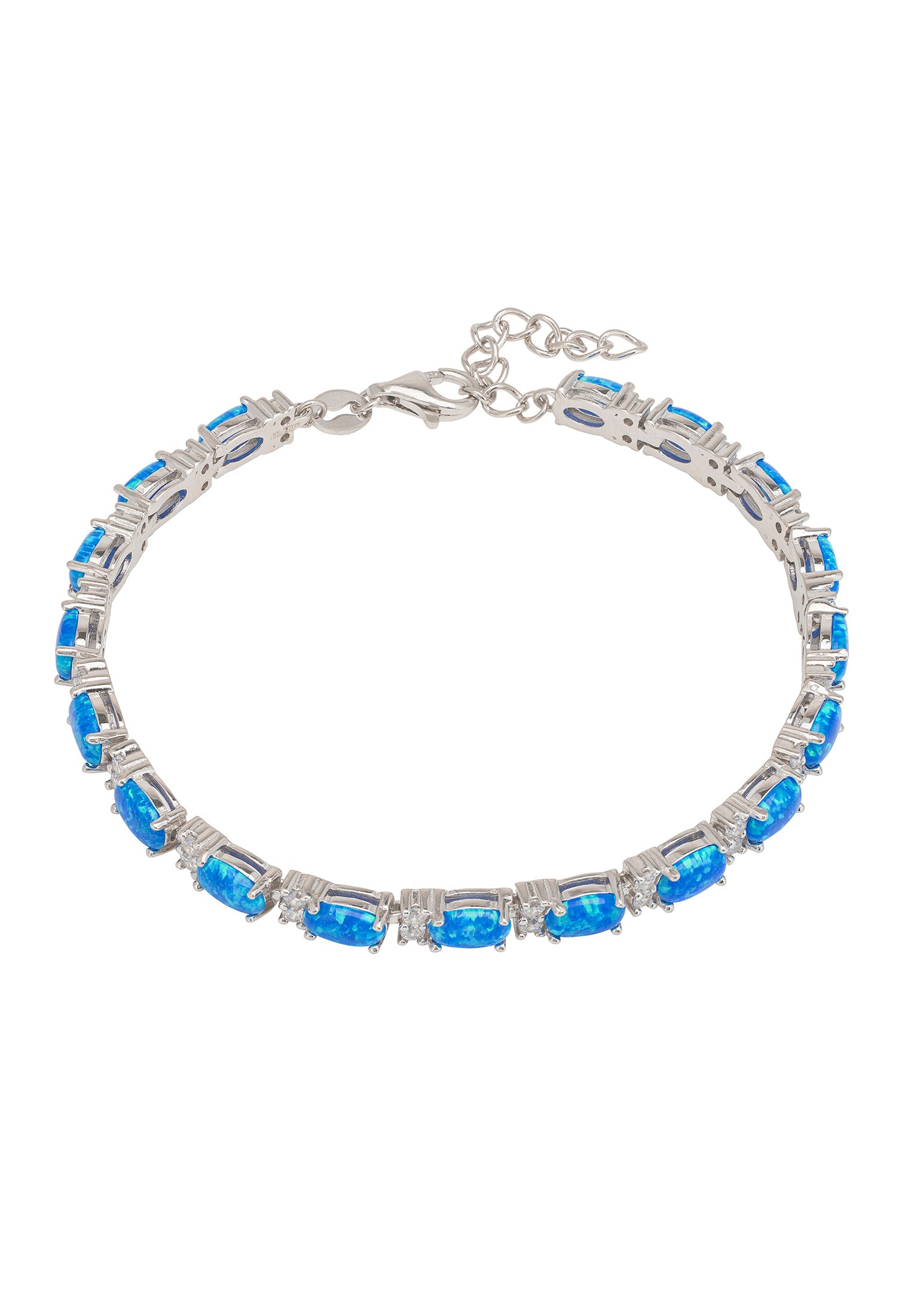 Silver bracelet with blue gemstones on a white background