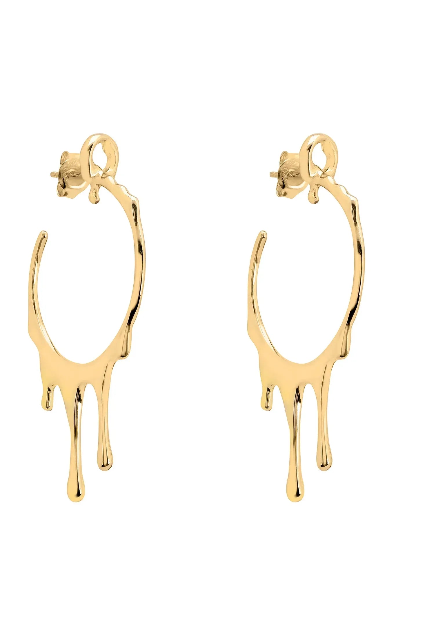 Melting gold hoop earrings.