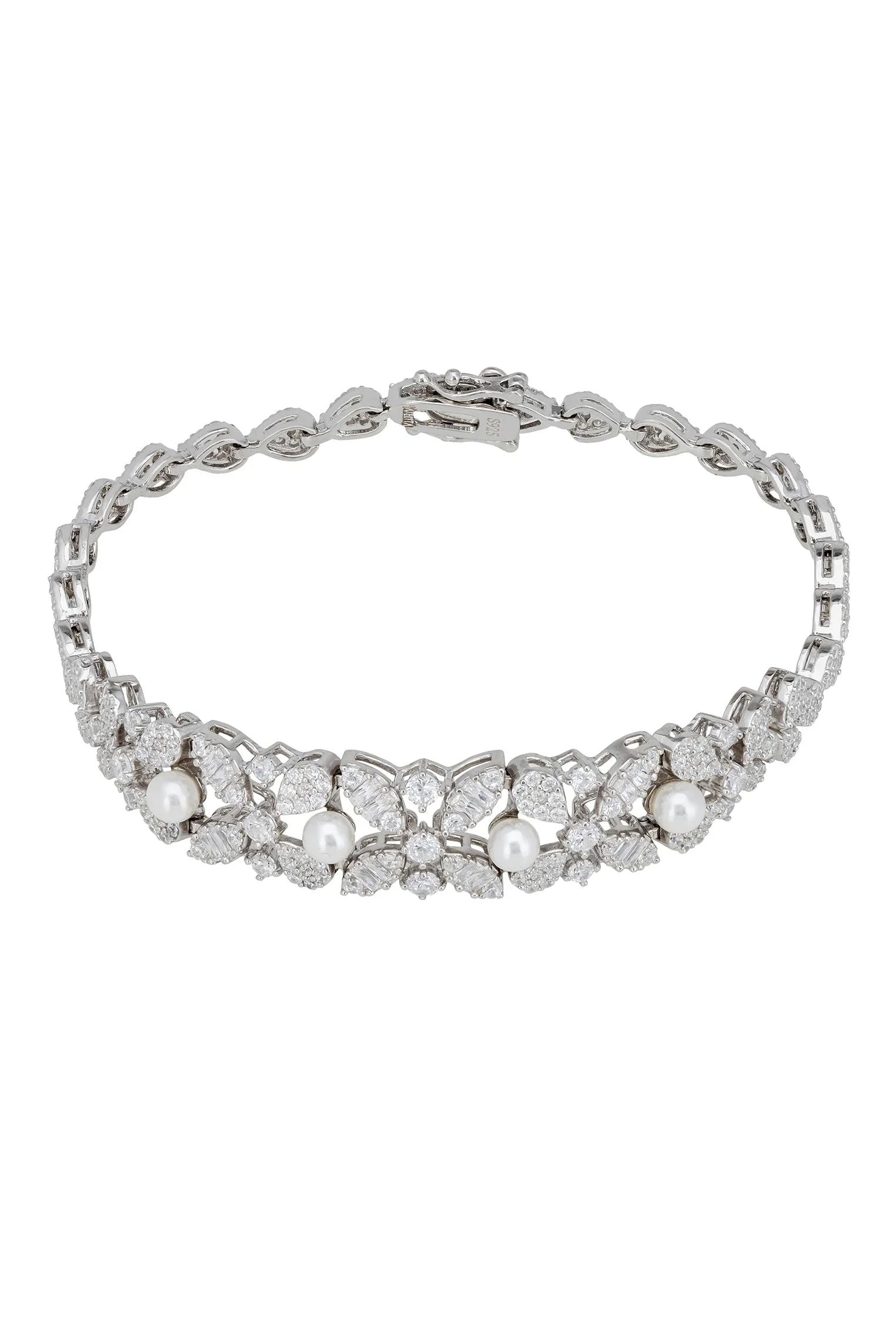 Floral diamond bracelet with pearls.