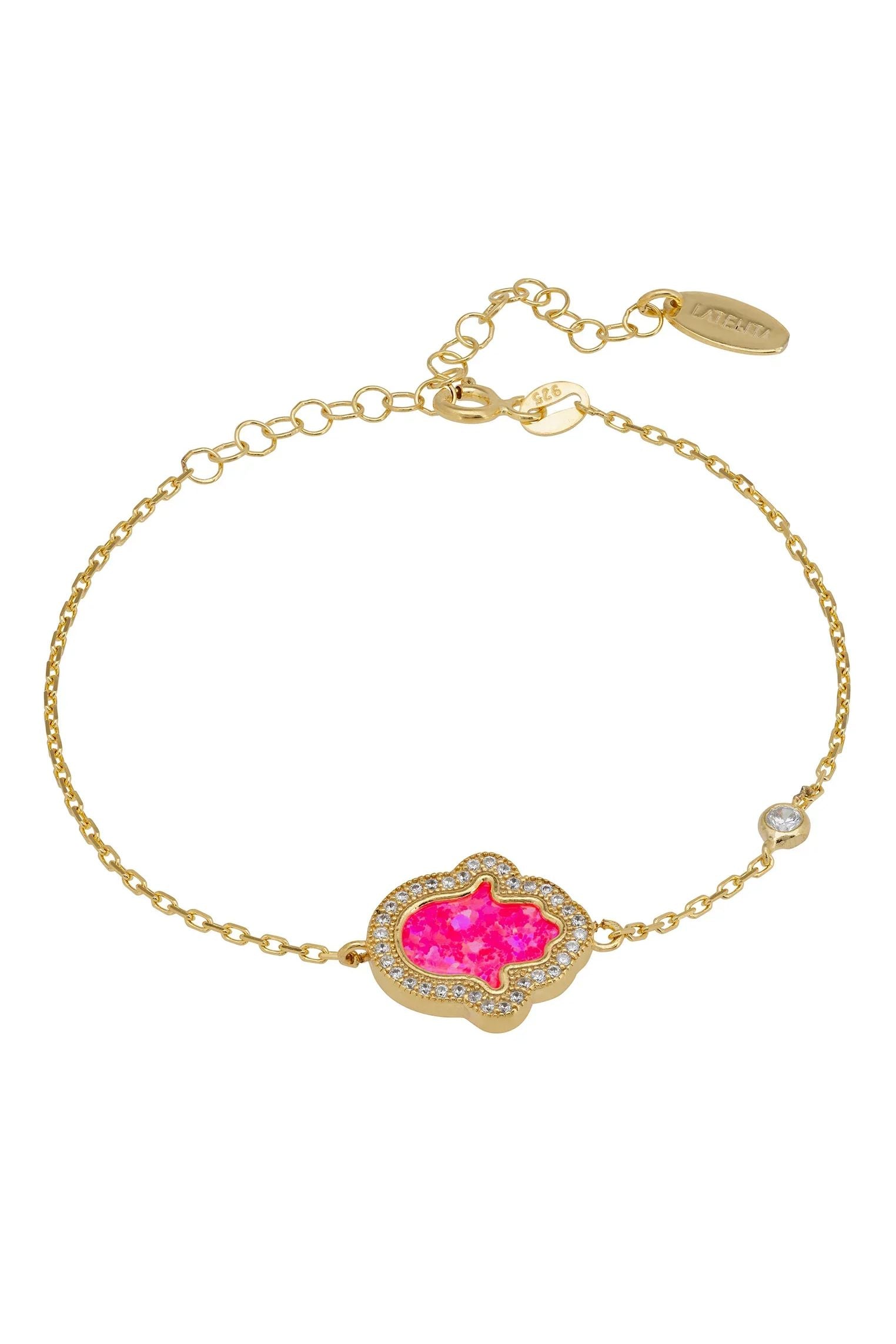 Pink opal hamsa hand gold bracelet.