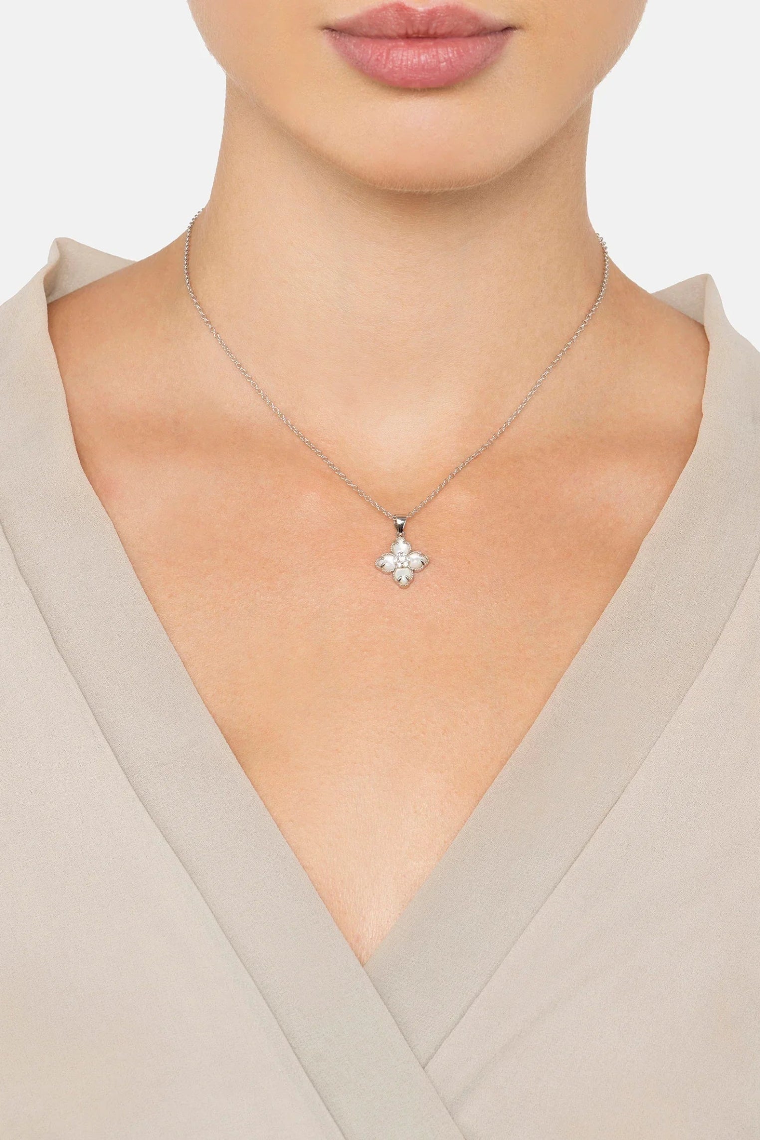 The necklace worn by a model.