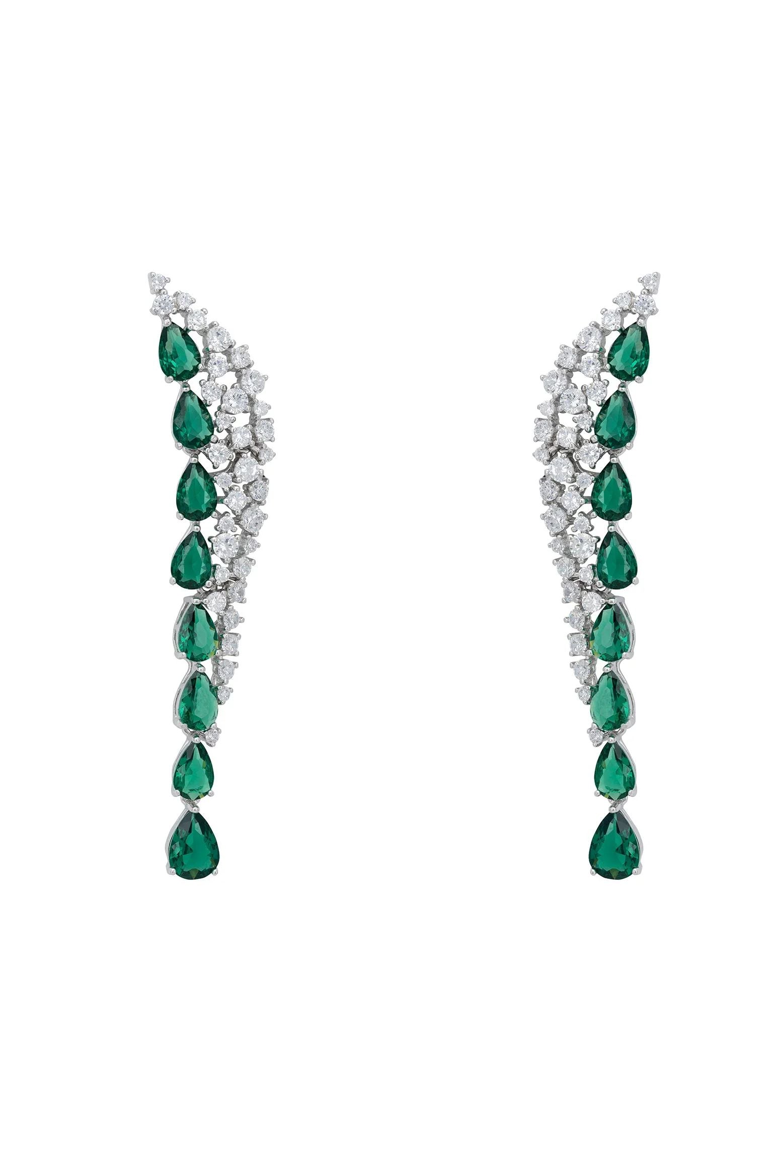 Emerald teardrops diamond earrings.