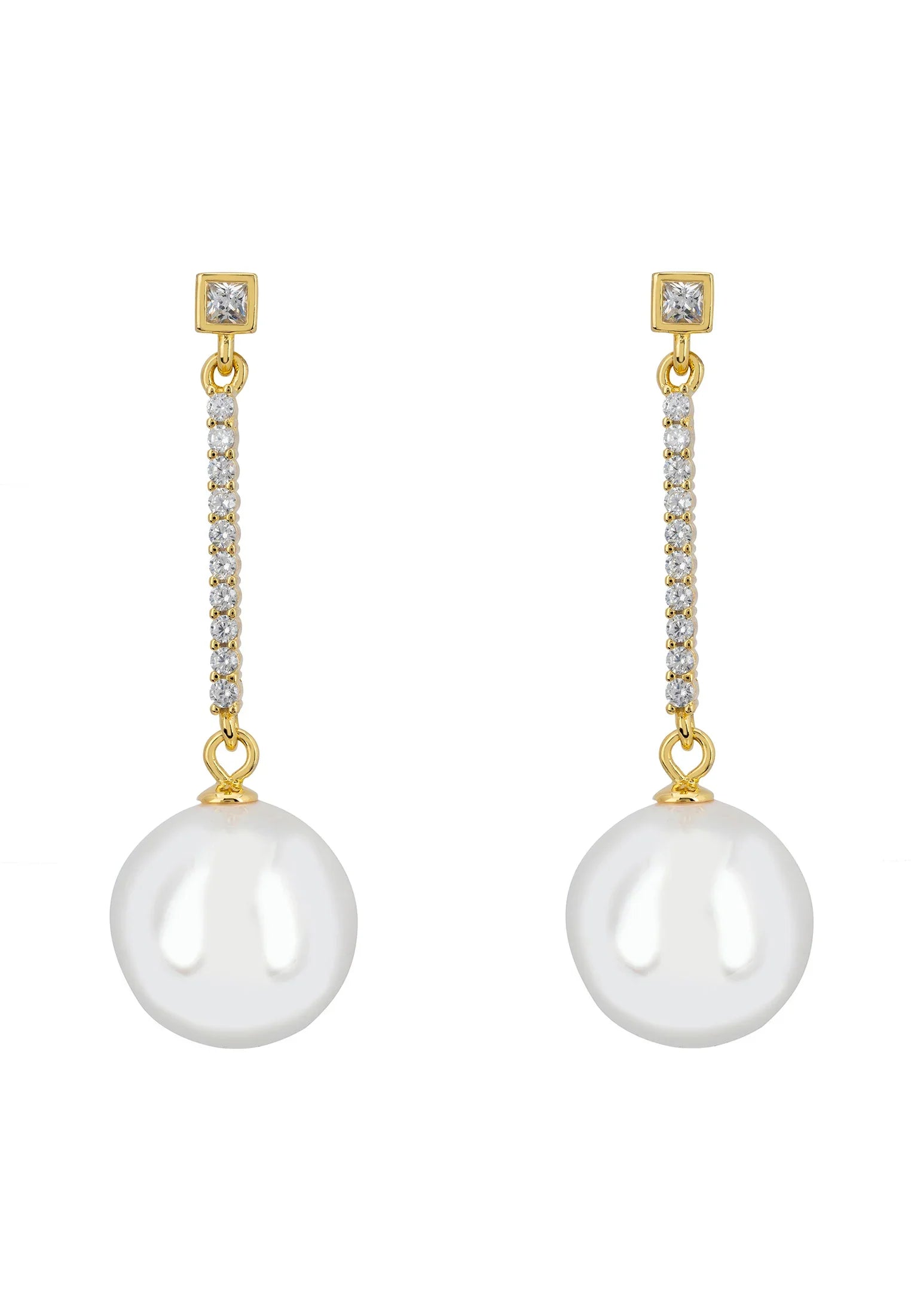 Gold string and pearl drop earrings.