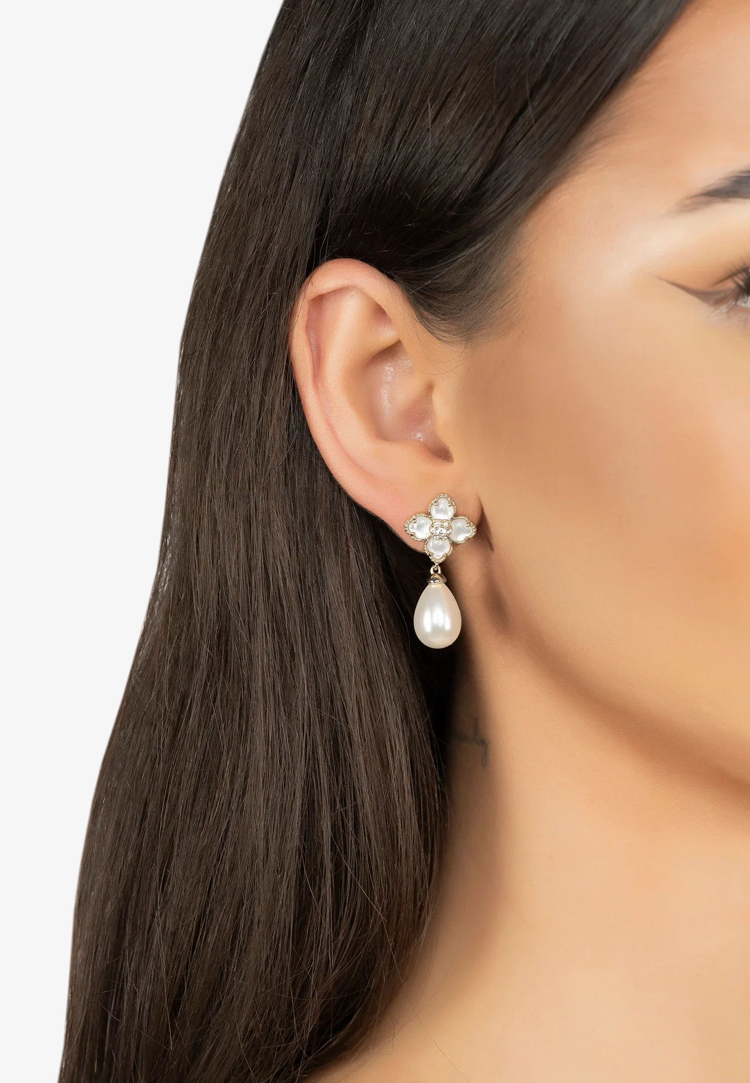 The earring worn by a model.