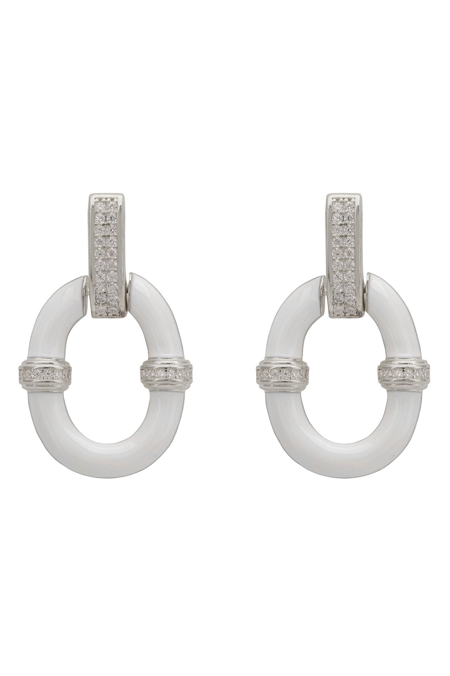 Pair of earrings with white circular stones and silver accents on a white background
