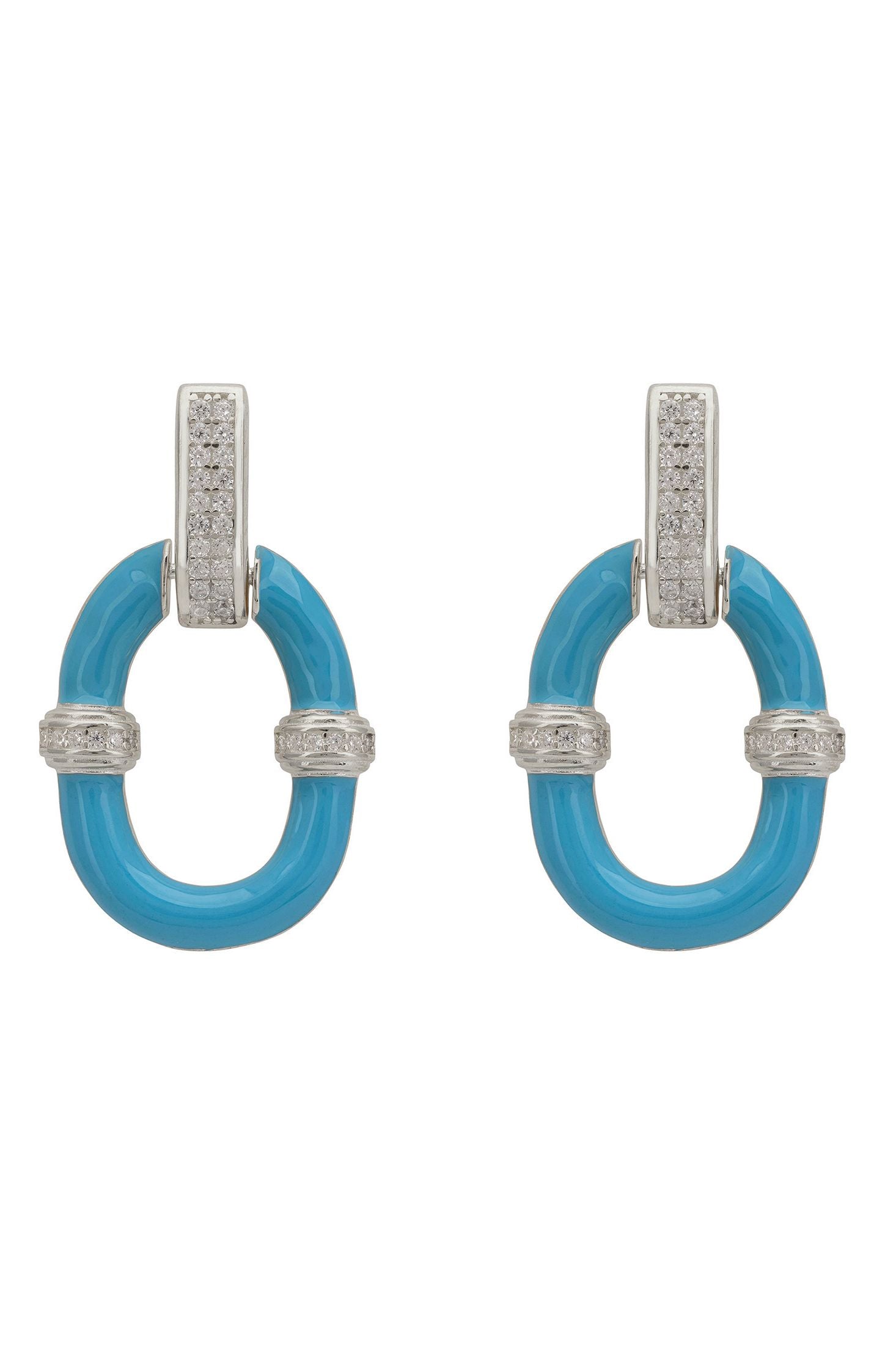 Pair of turquoise earrings with silver accents on a white background