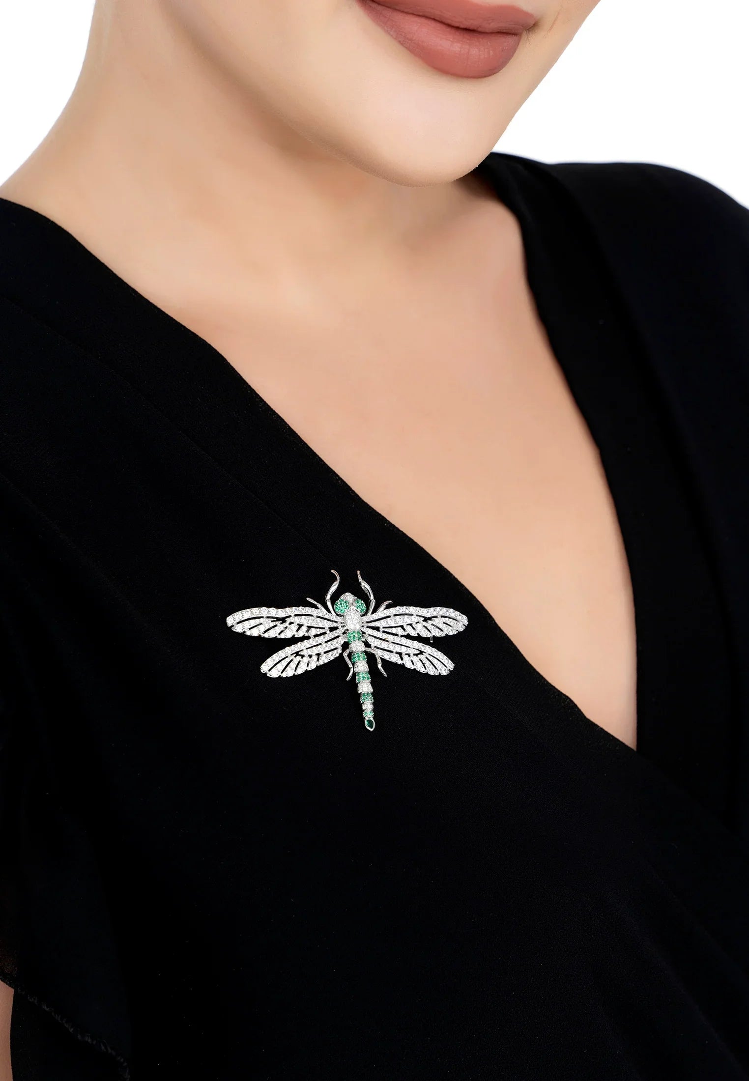 The brooch worn by a model.