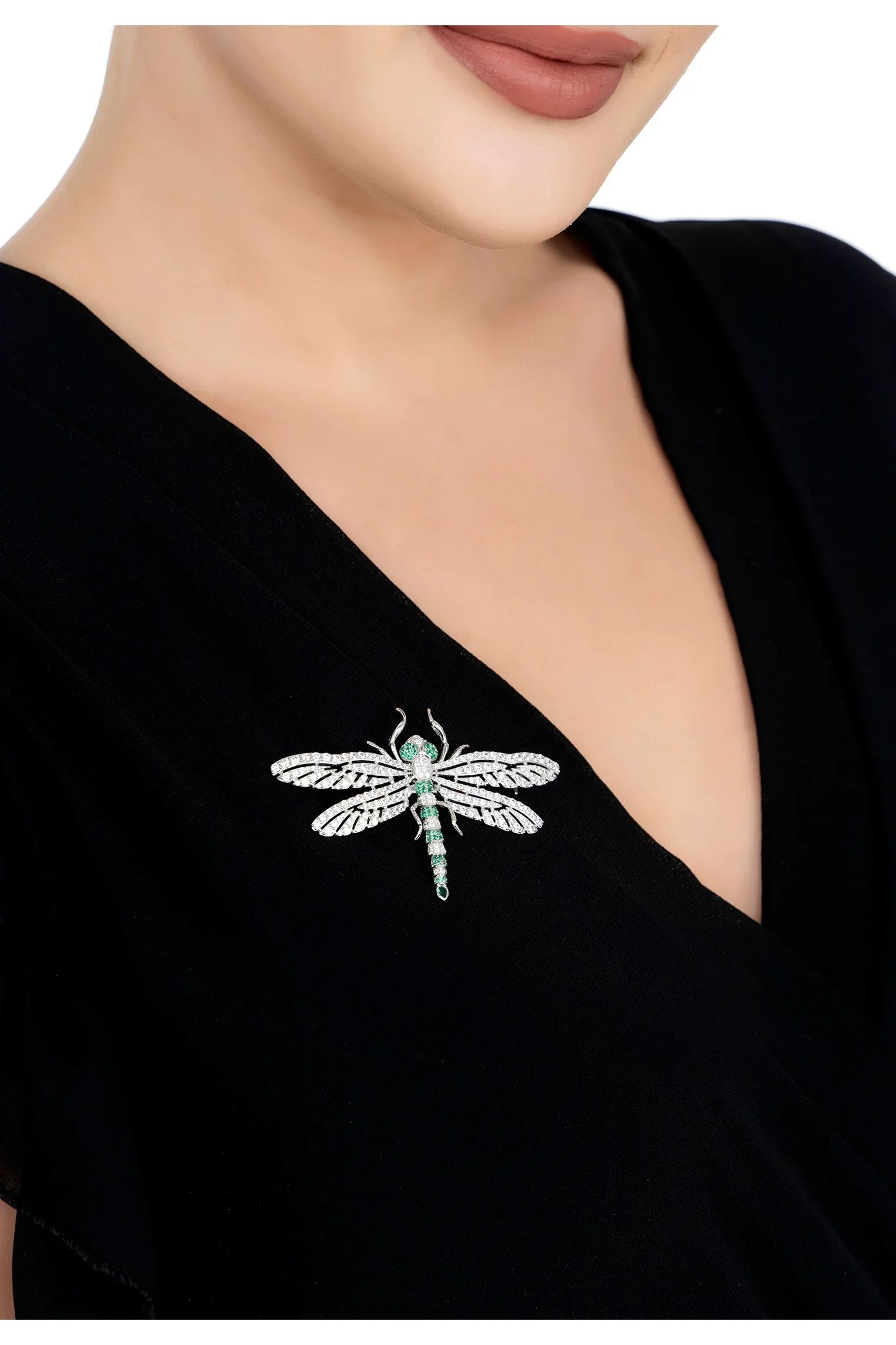 The brooch worn by a model.