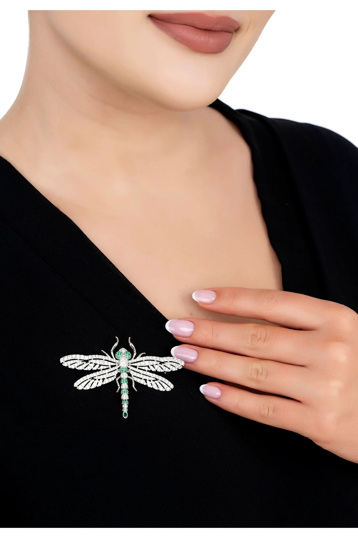 The brooch worn by a model.