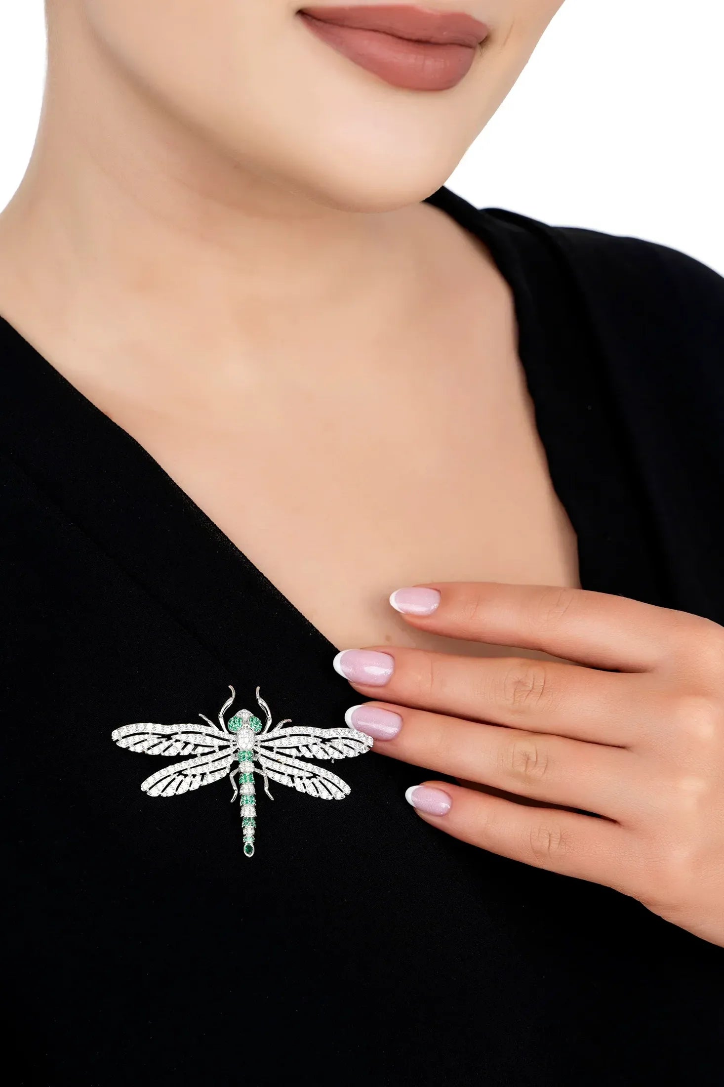 The brooch worn by a model.