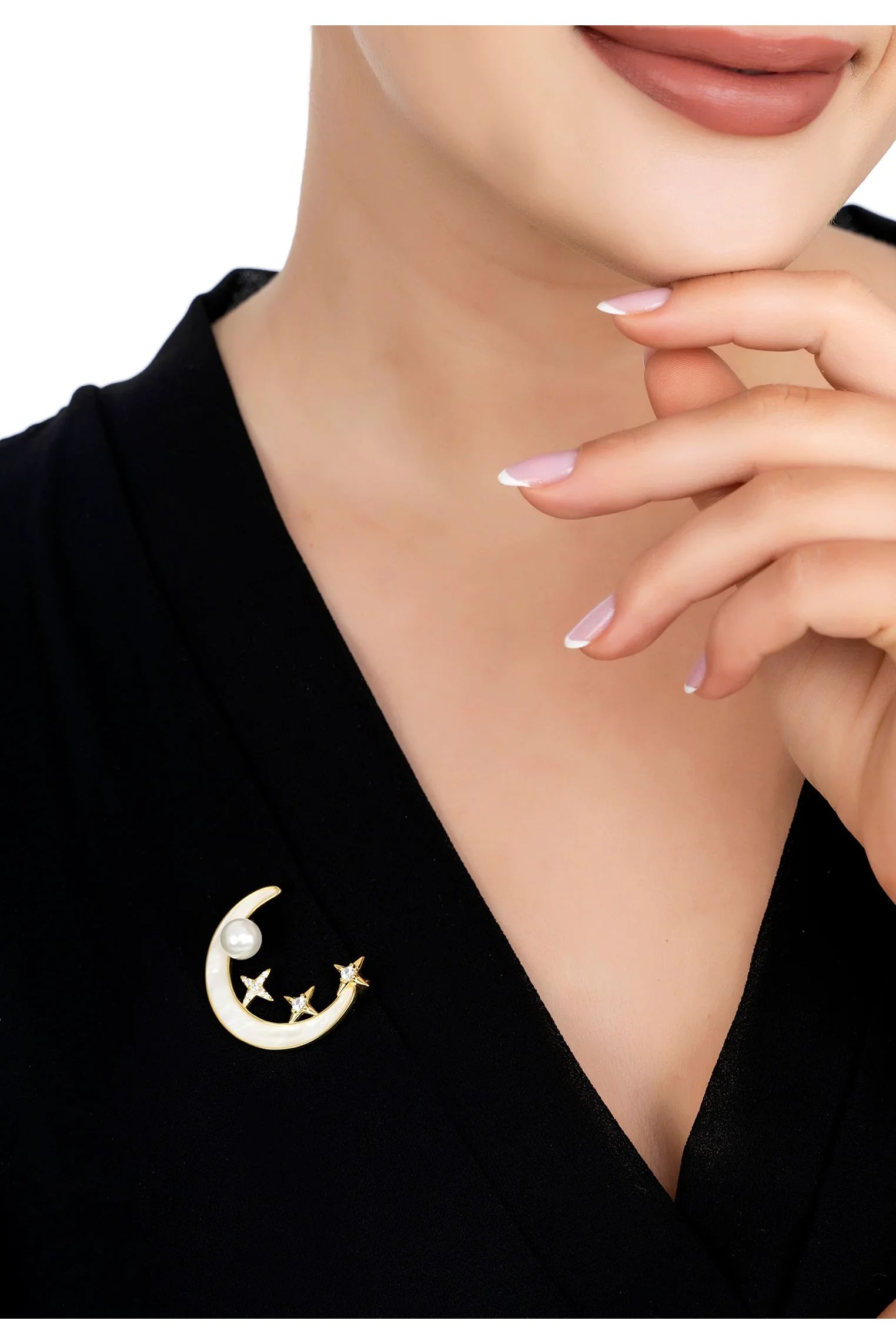 The brooch worn by a model.