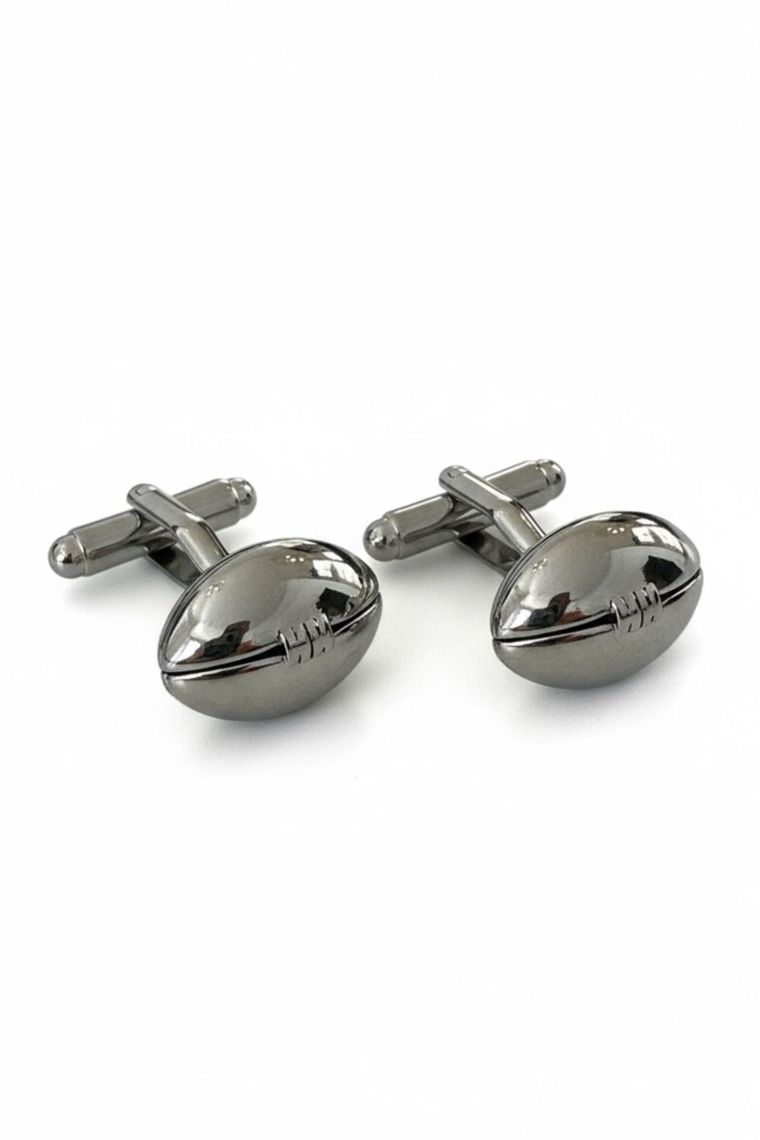 Silver American football cufflinks.