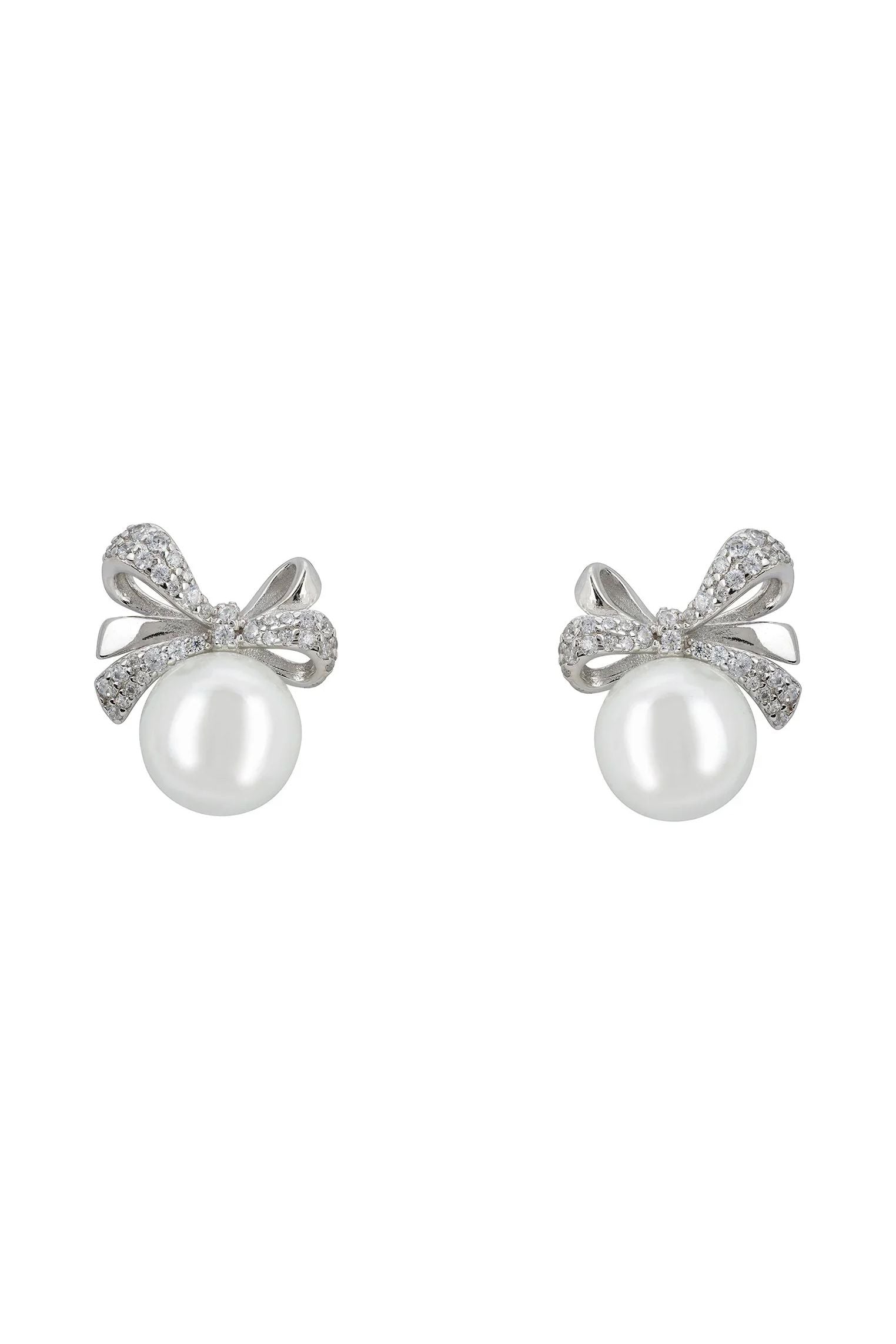 Pearl and silver bow stud earrings.