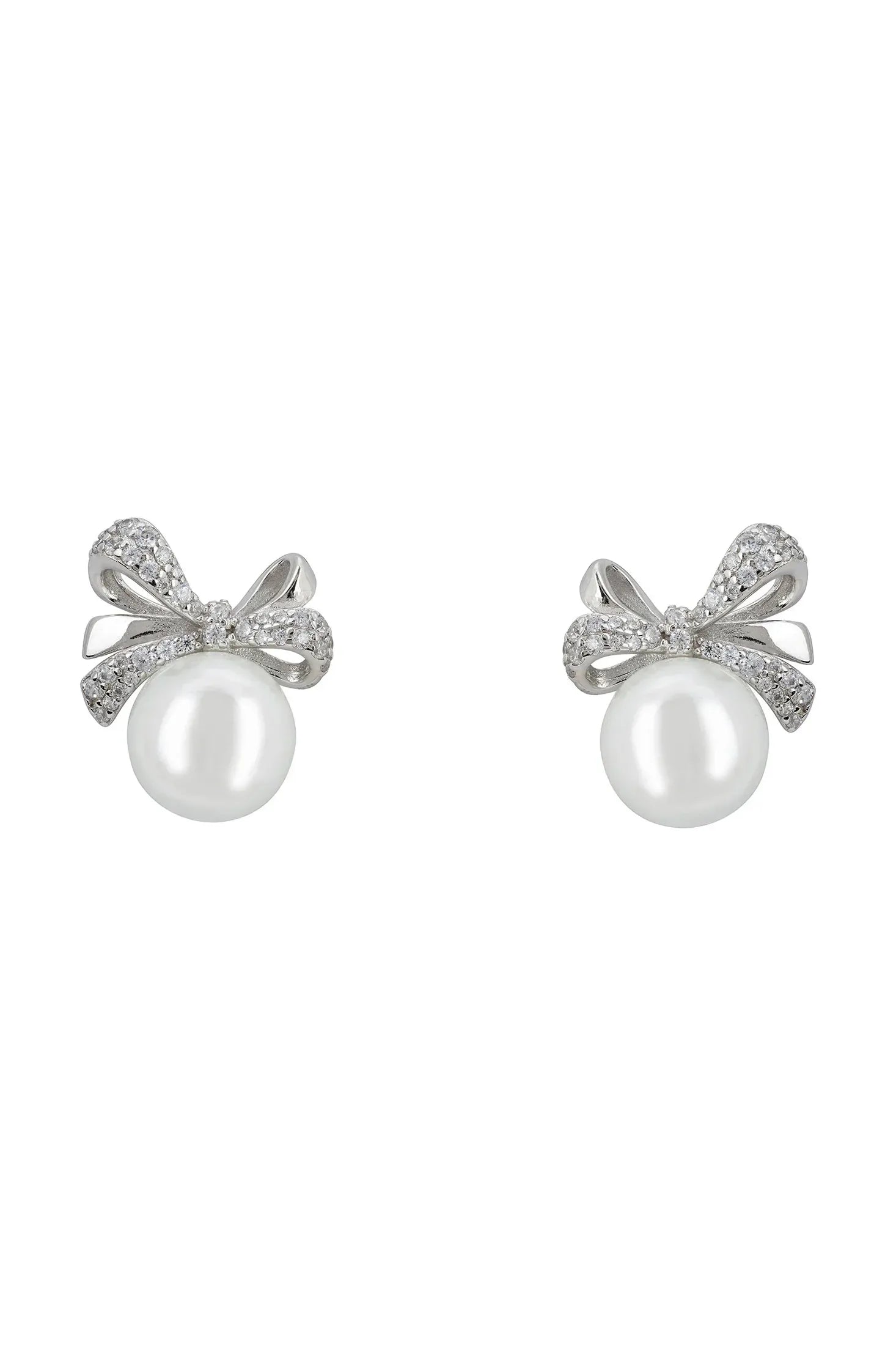 Pearl and silver bow stud earrings.