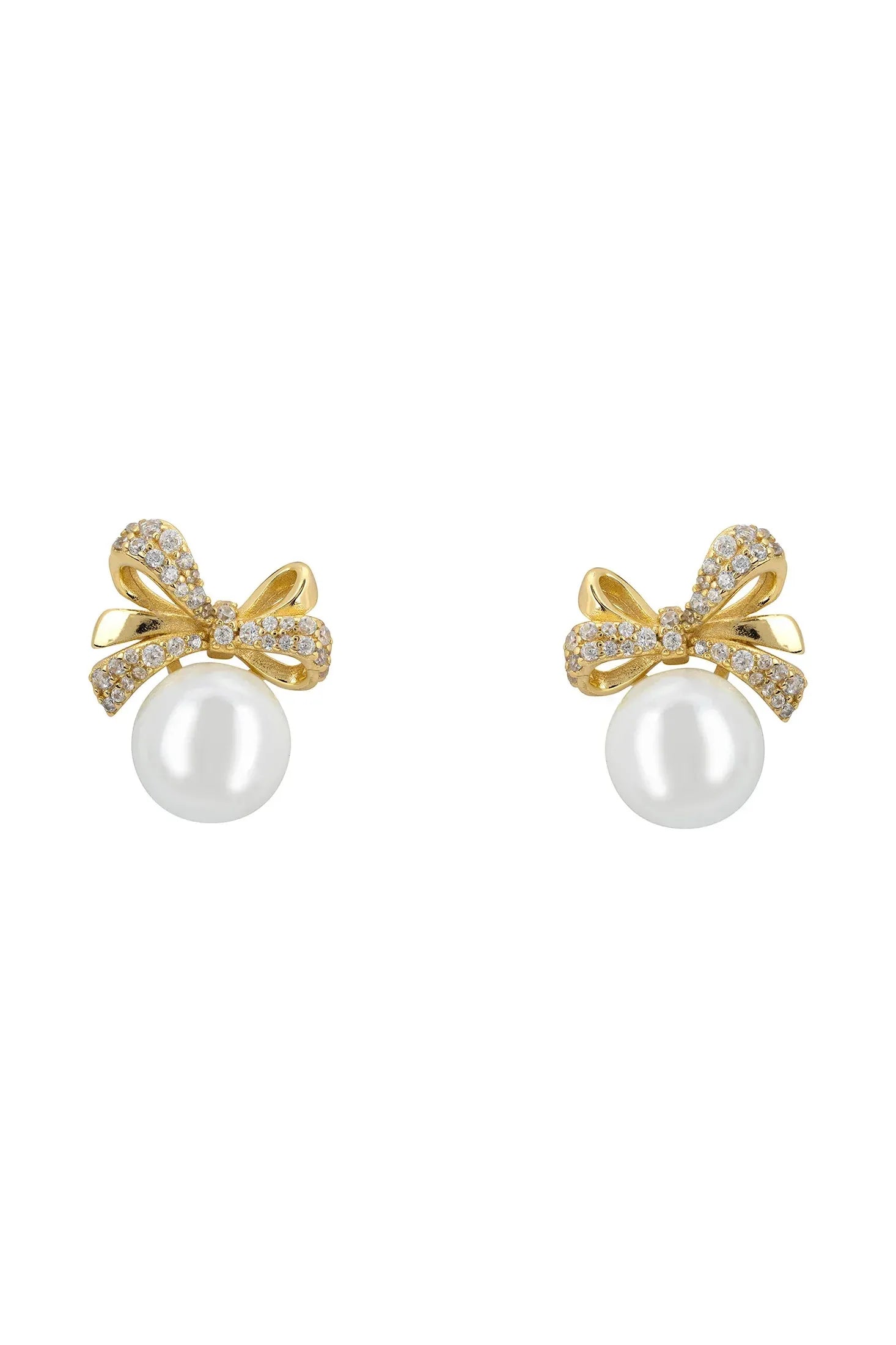 Pearl and gold bow stud earrings.