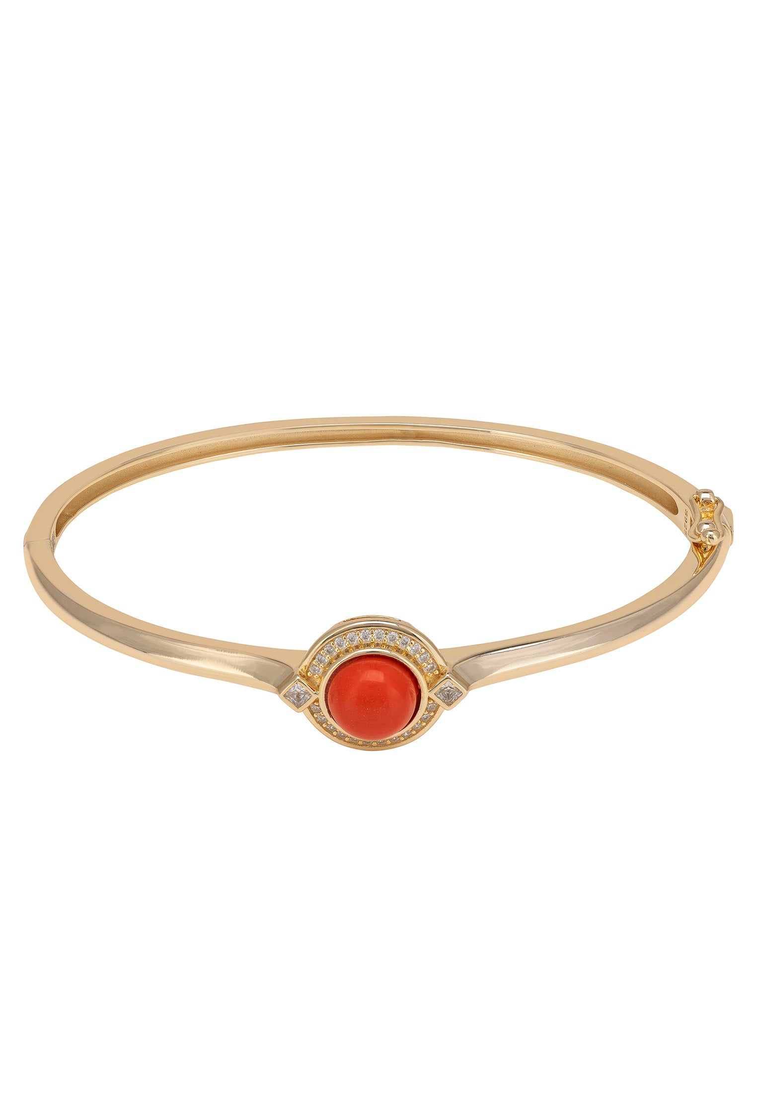 Gold bracelet with a red gemstone on a white background