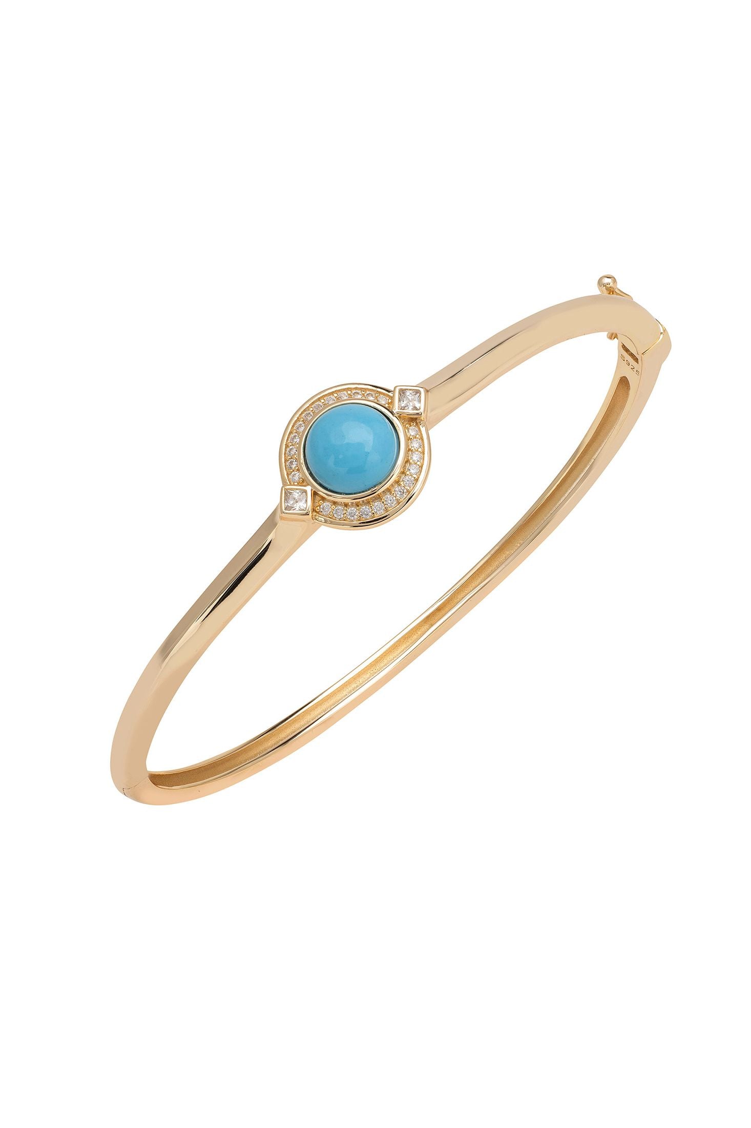 Gold bracelet with a blue gemstone on a white background