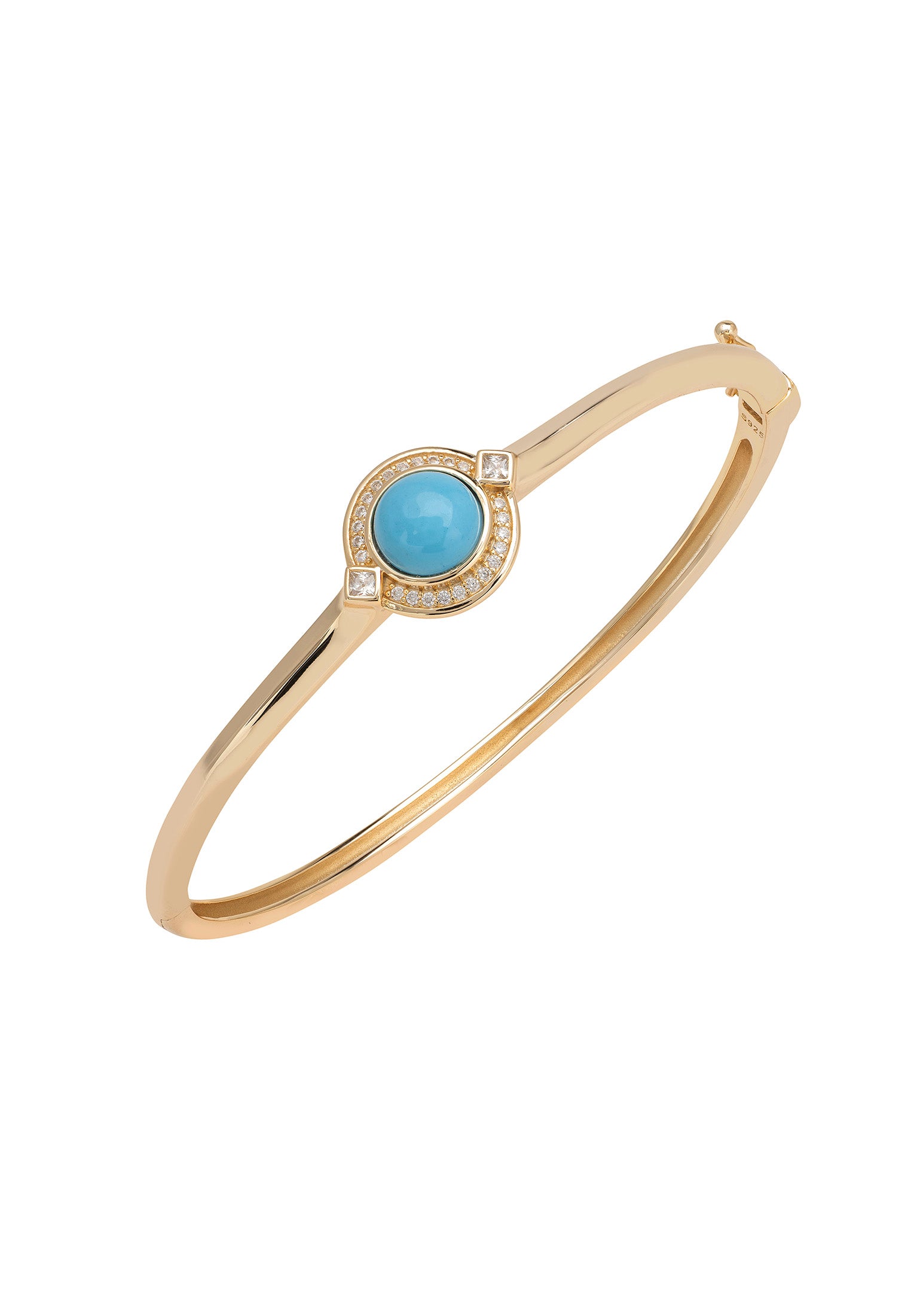 Gold bracelet with a blue gemstone on a white background