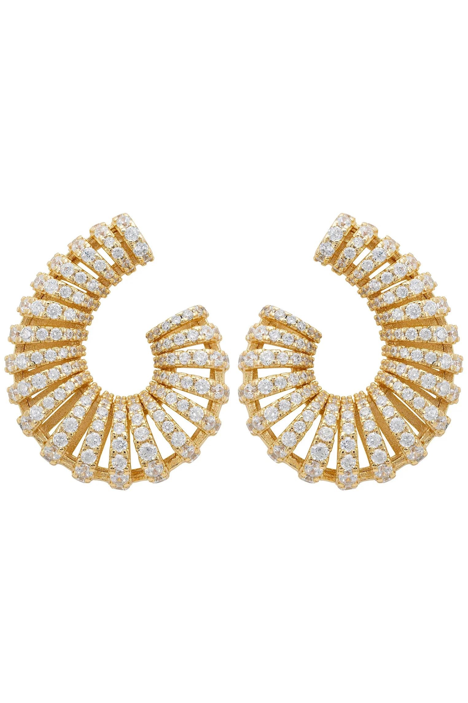 Diamond swirl gold earrings.