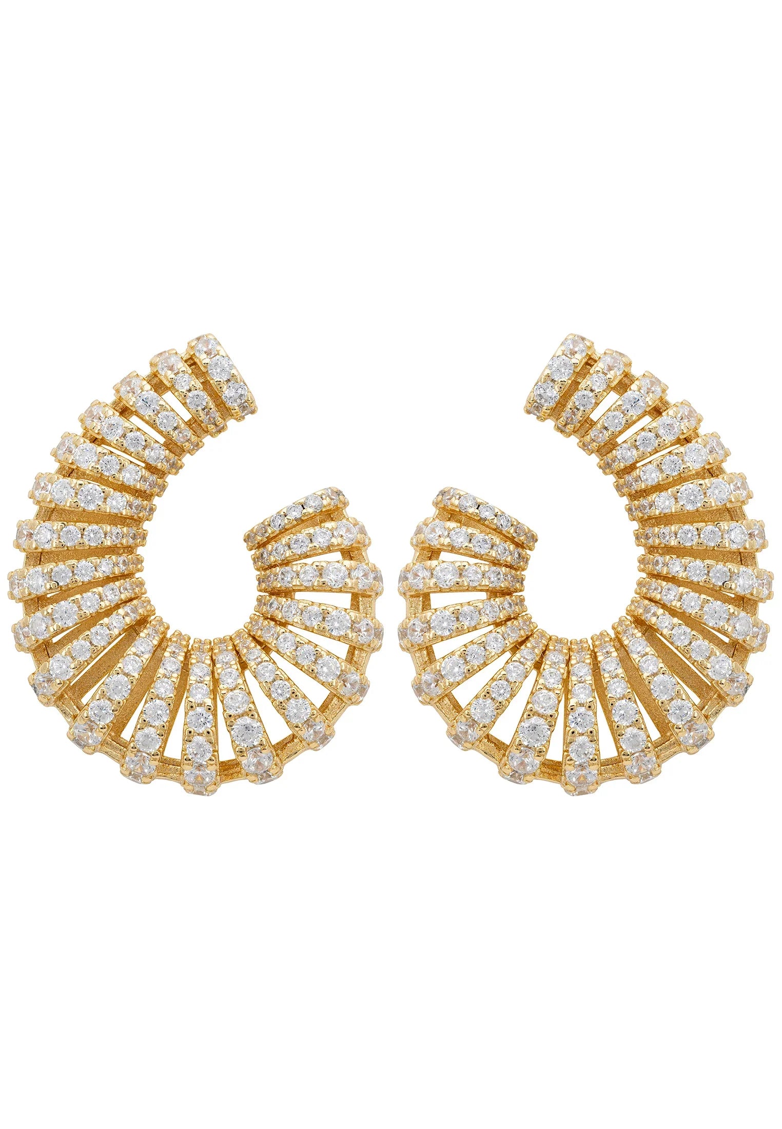 Diamond swirl gold earrings.