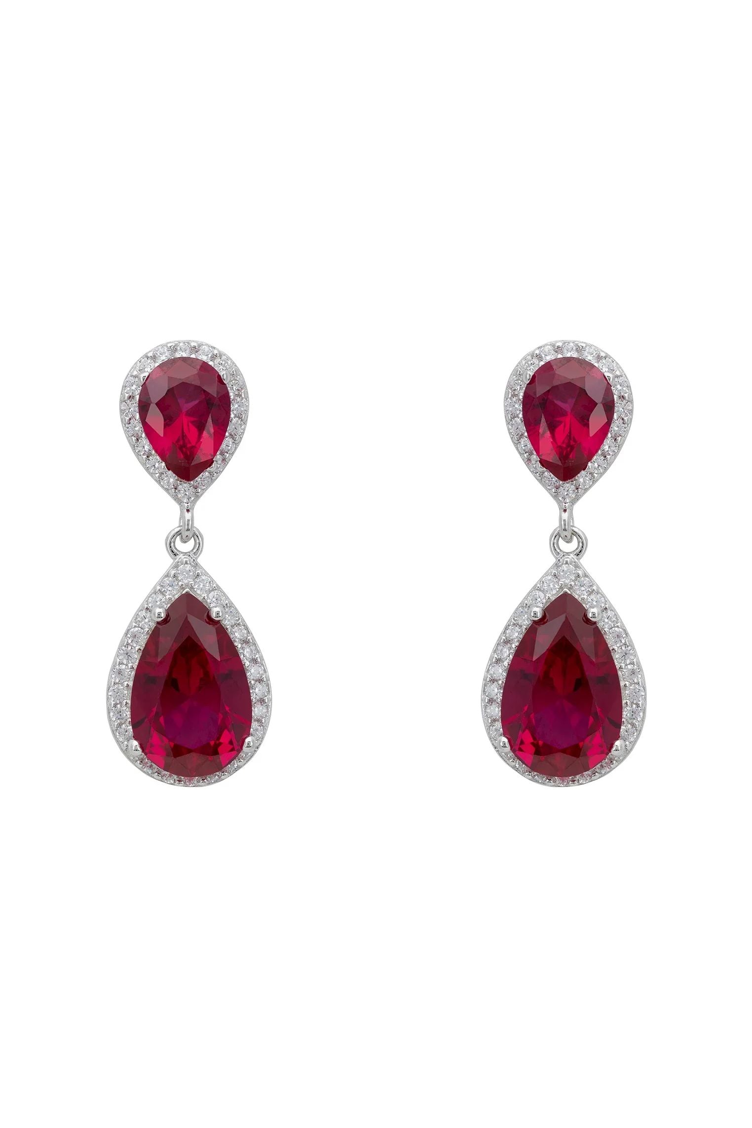 Diamond halo ruby drop earrings.