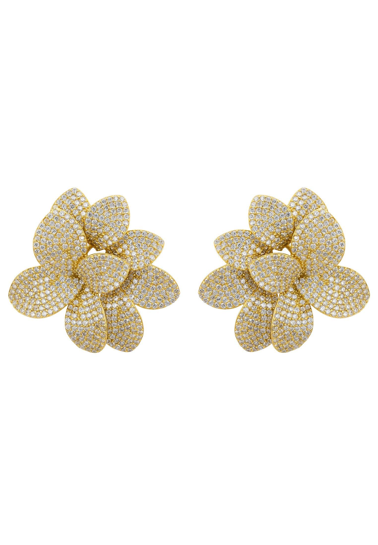 Gold flower earrings.