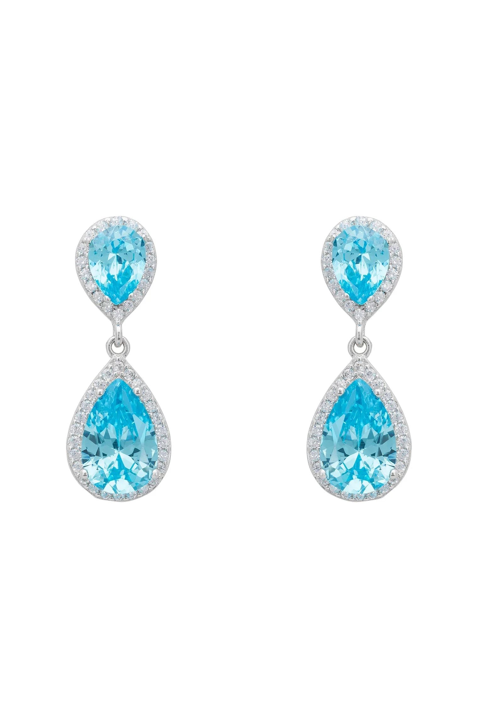 Diamond halo aquamarine drop earrings.