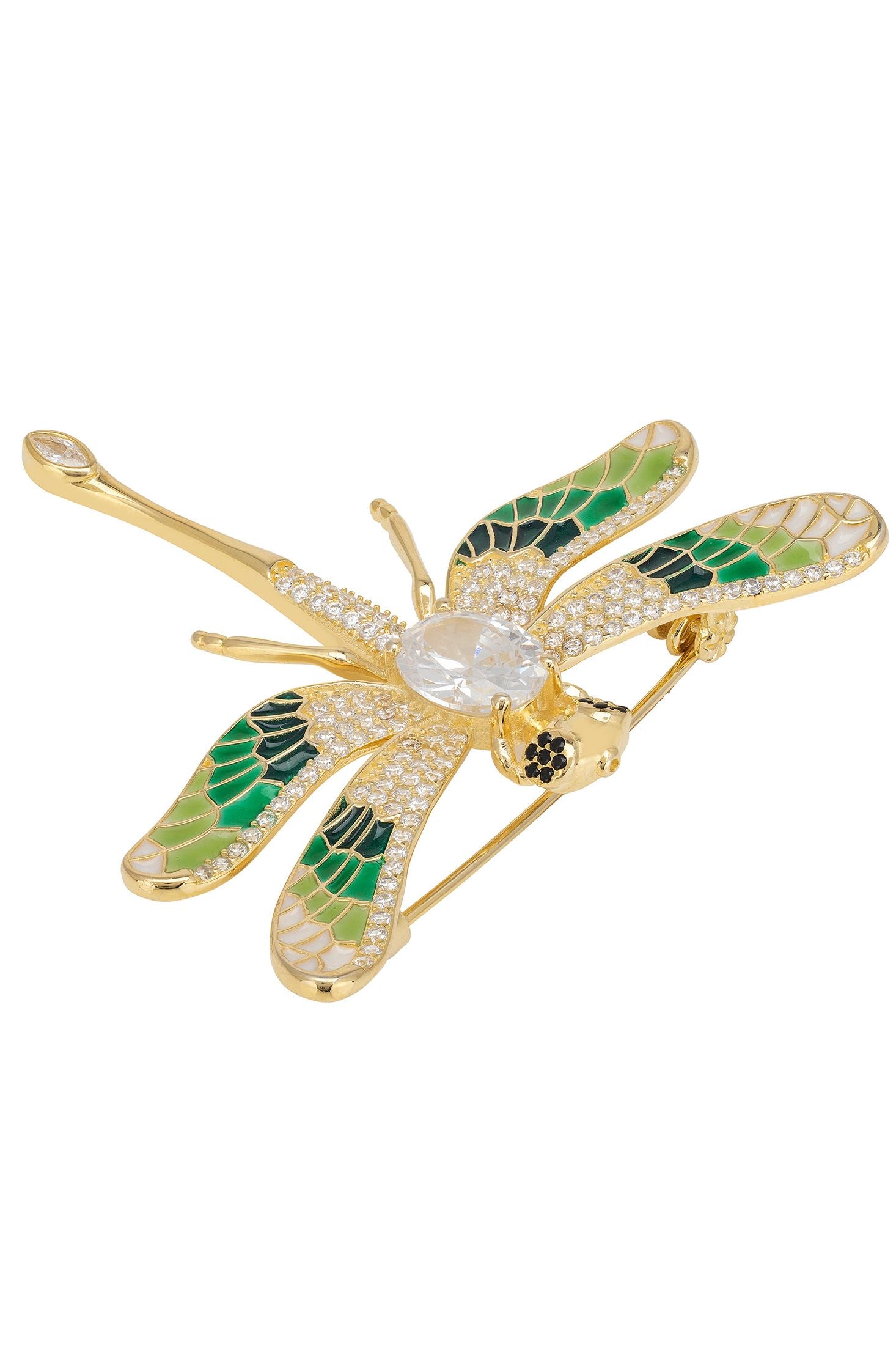 Gold dragonfly-shaped brooch with green and black details on a white background