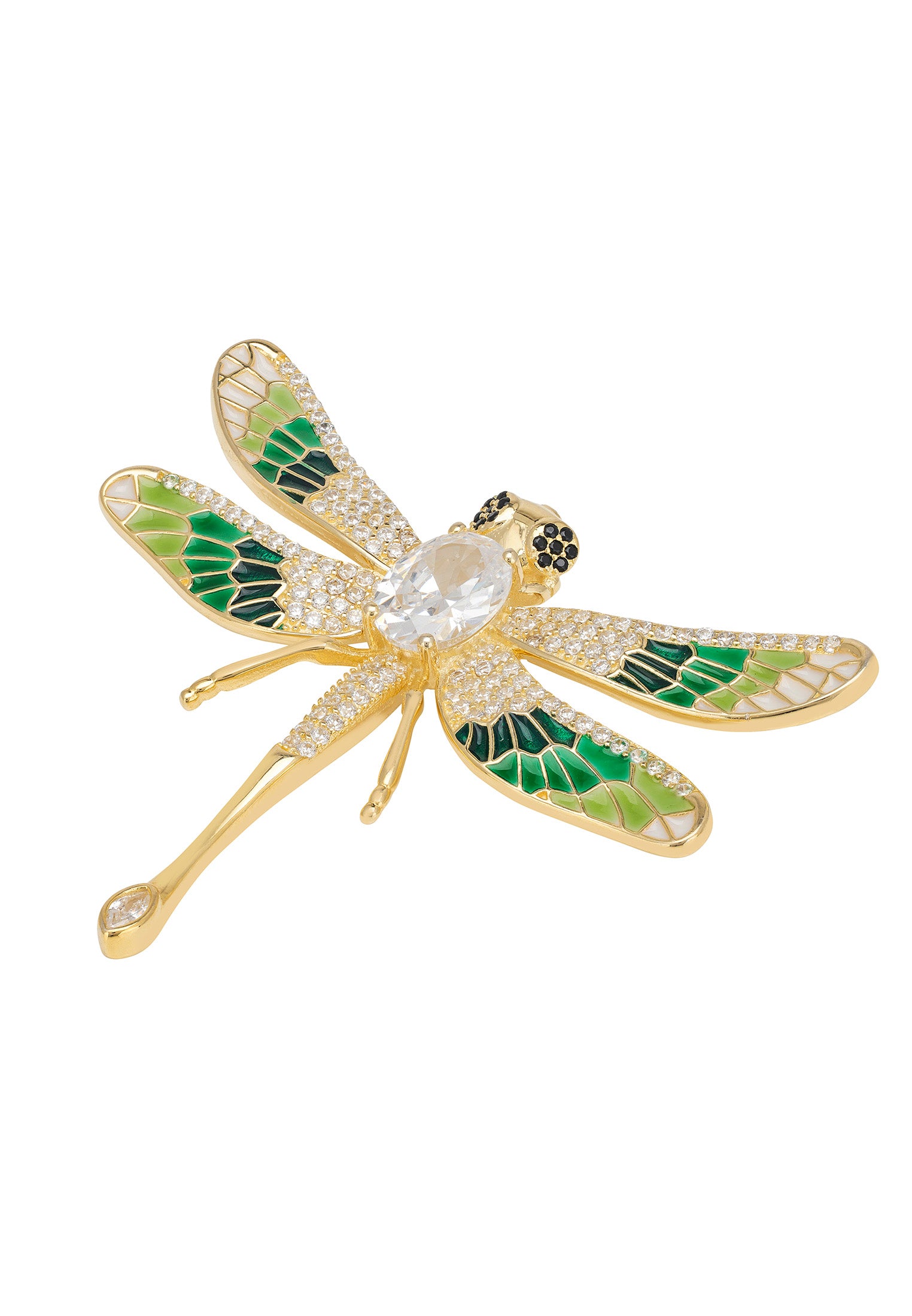 Gold and green dragonfly-shaped brooch on a white background