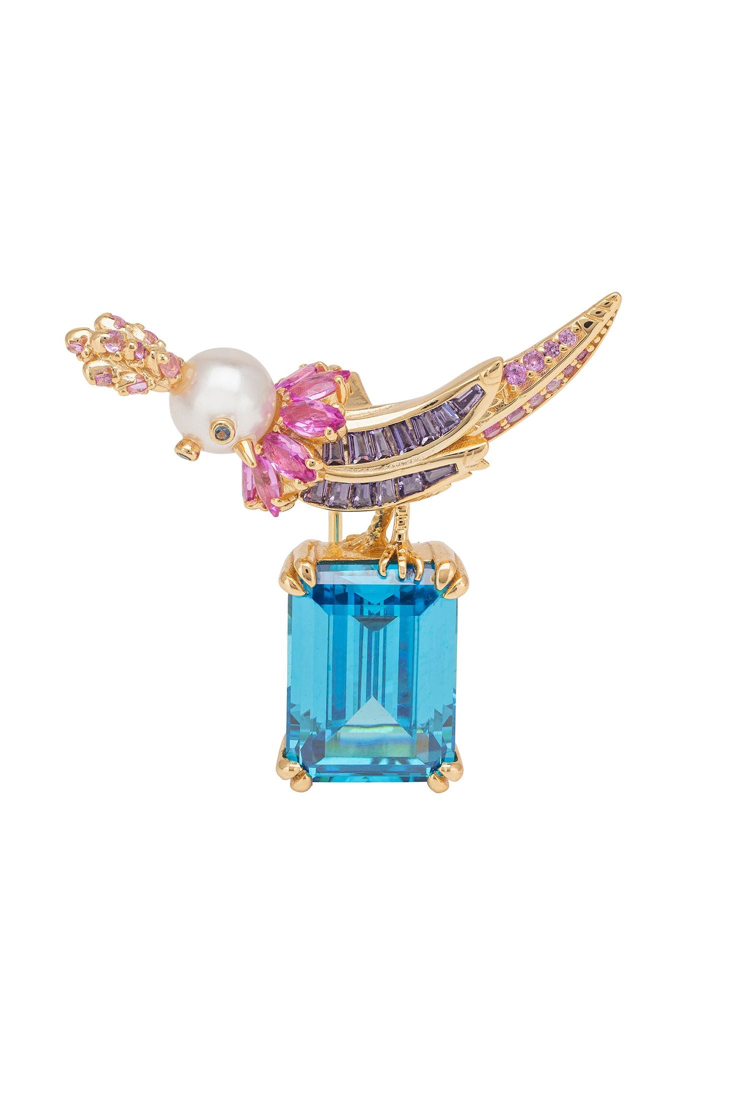 Gold brooch with blue gemstone, pearl, and pink stones on a white background