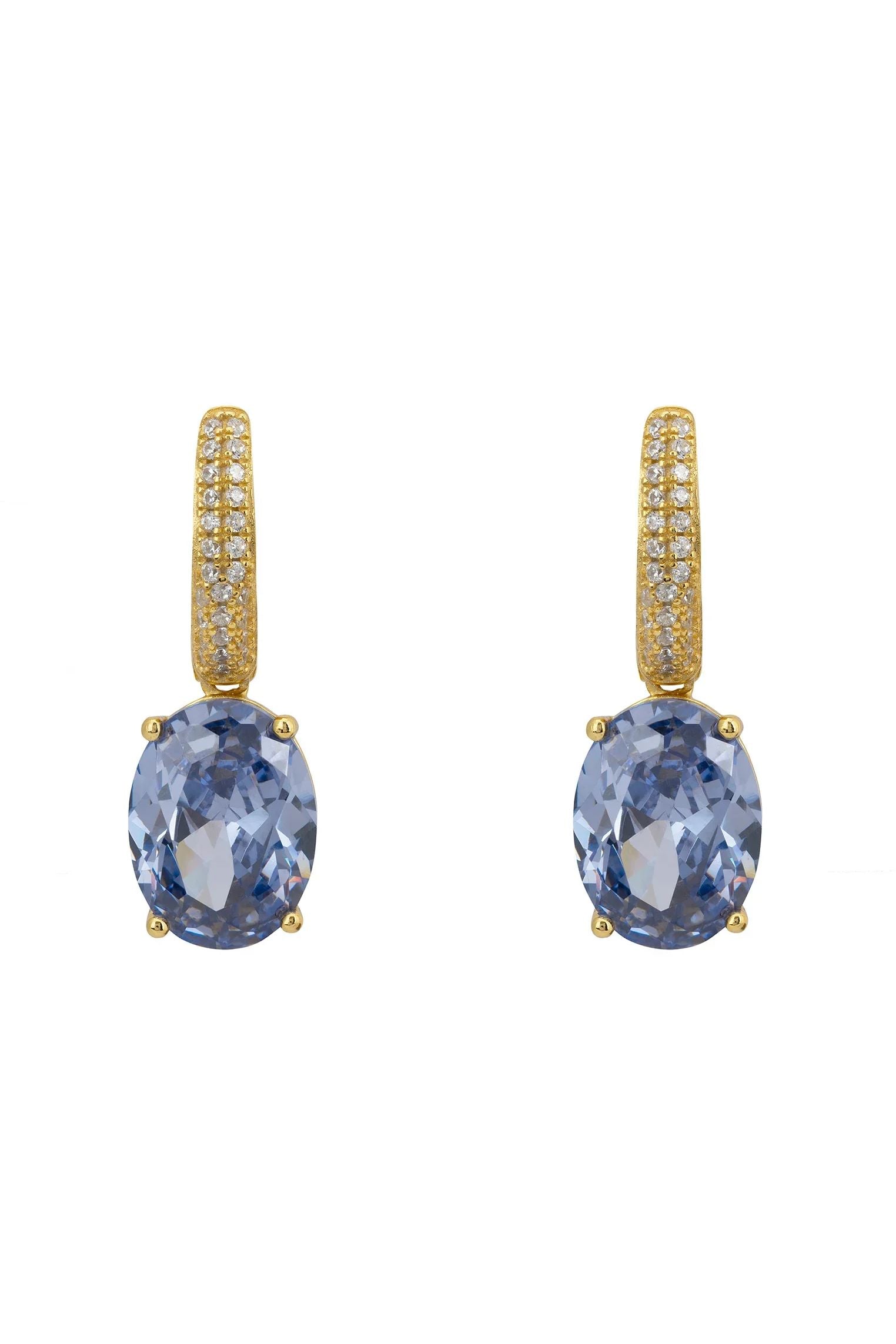 Oval blue gemstone gold earrings.