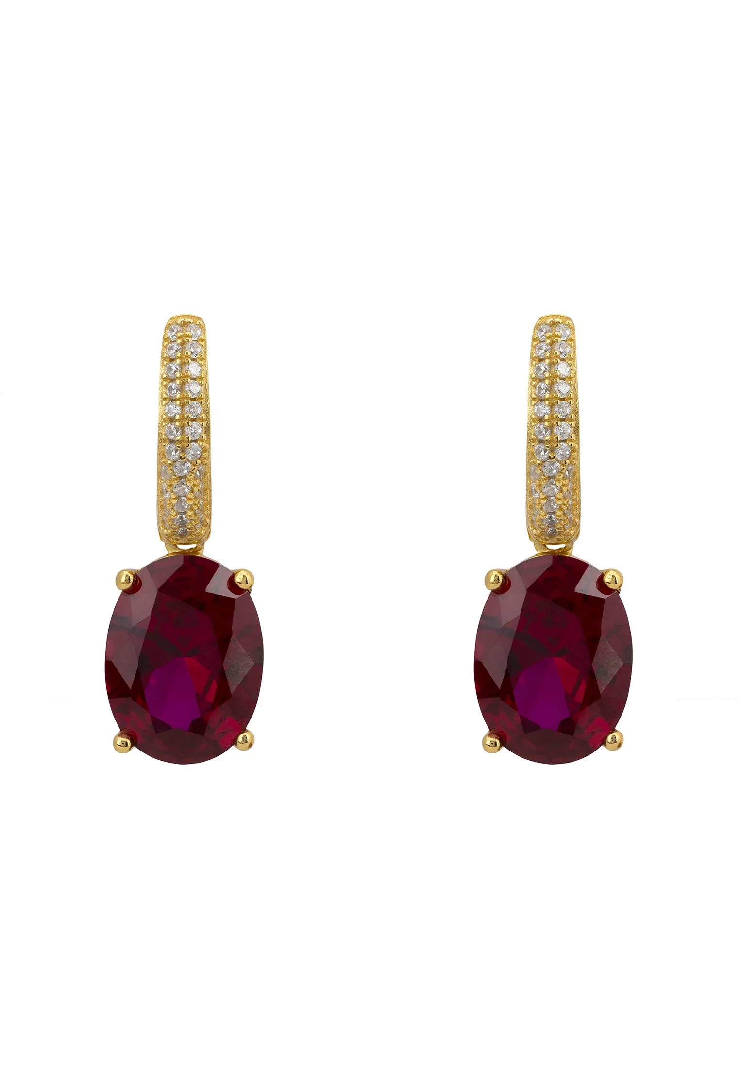 Oval ruby gold earrings.