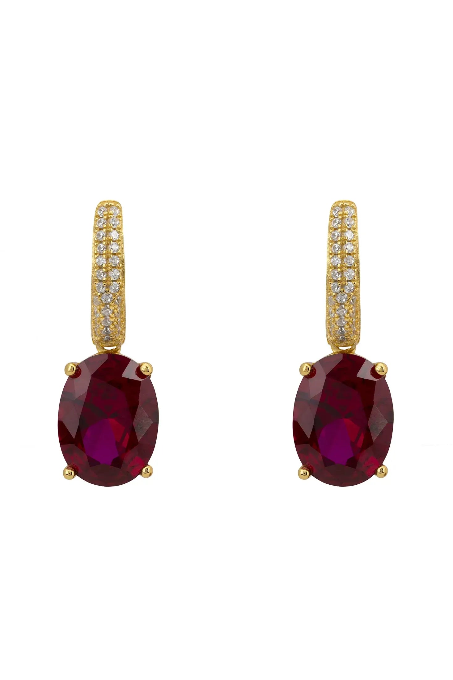 Oval ruby gold earrings.