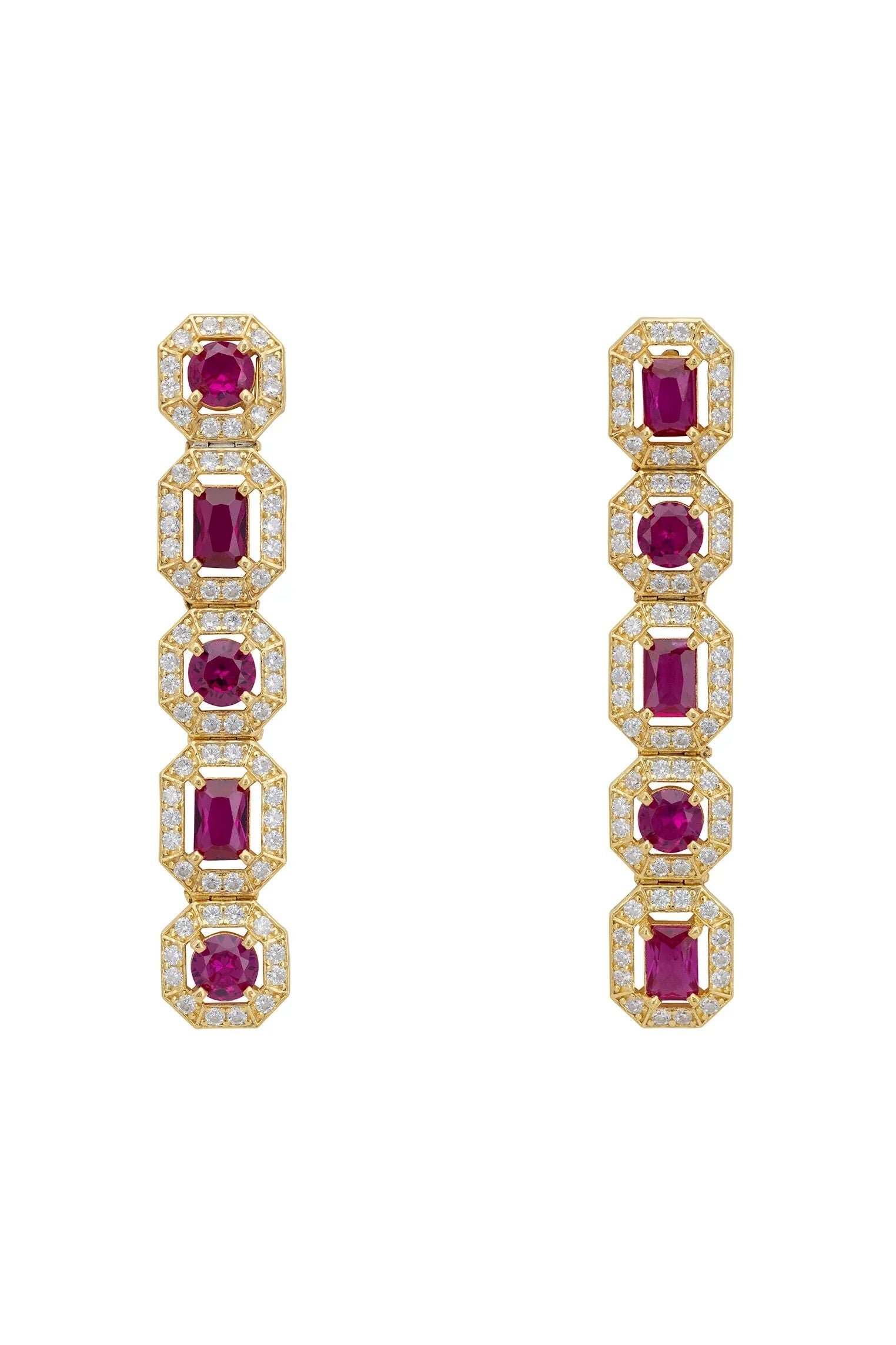 Gold and diamond halo ruby earrings.