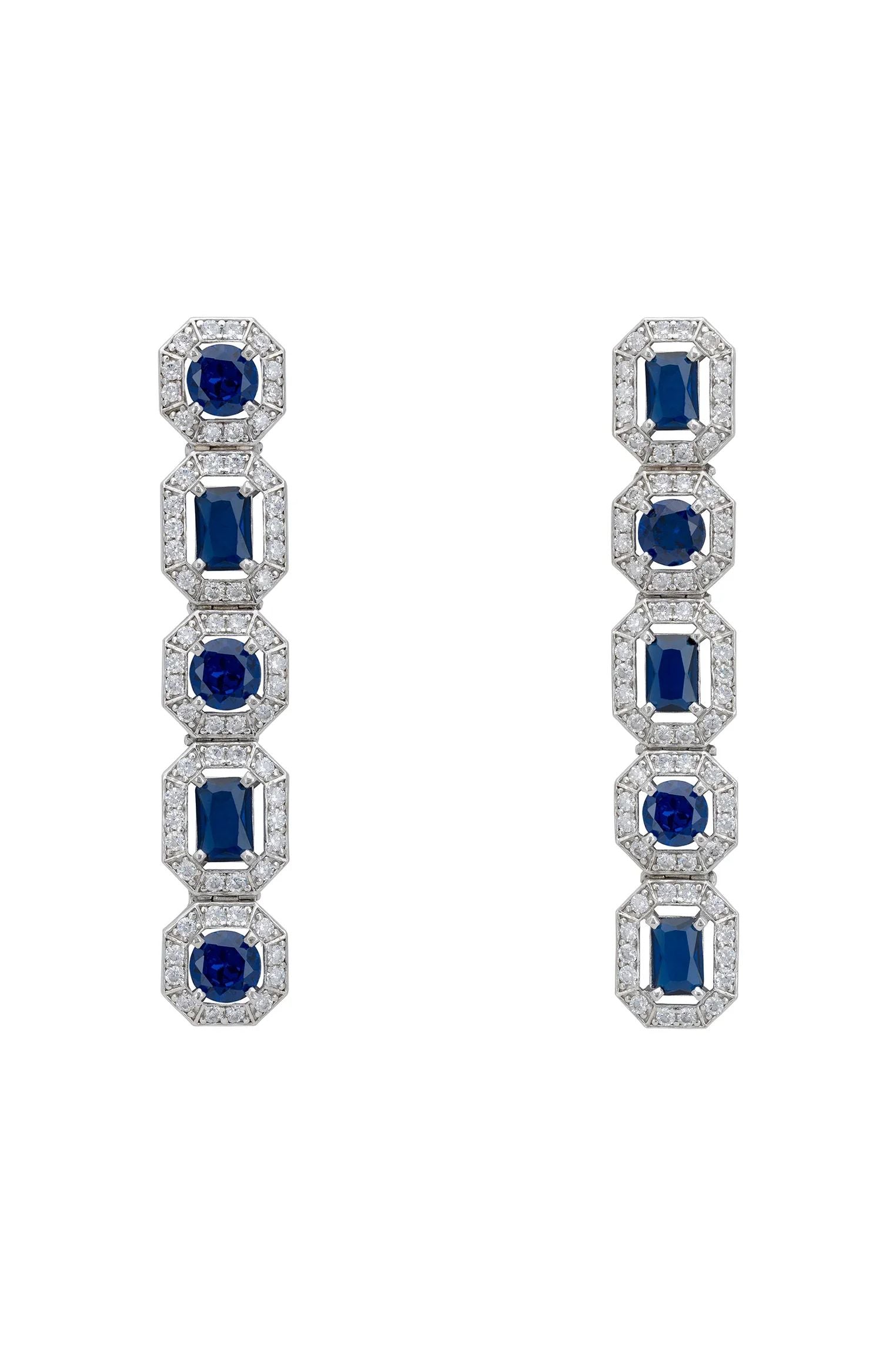 Diamond halo sapphire earrings.
