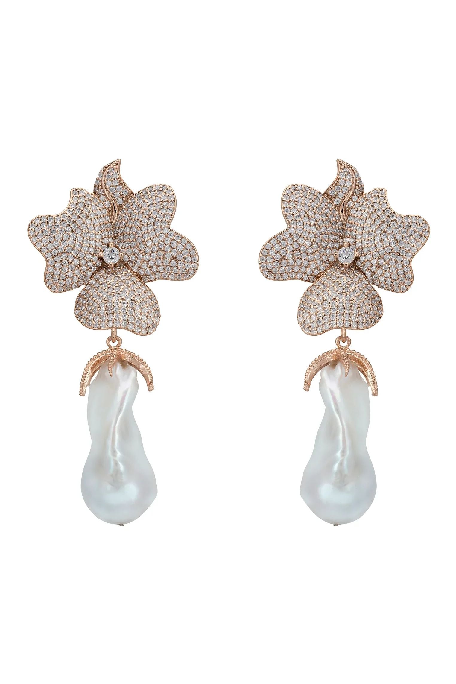 Large pearl and rose gold flower earrings.