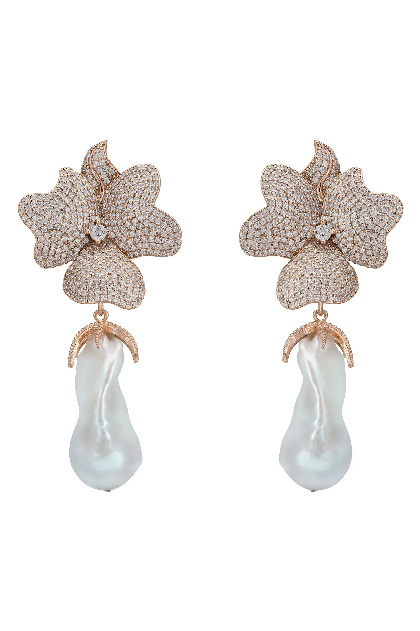 Large pearl and rose gold flower earrings.
