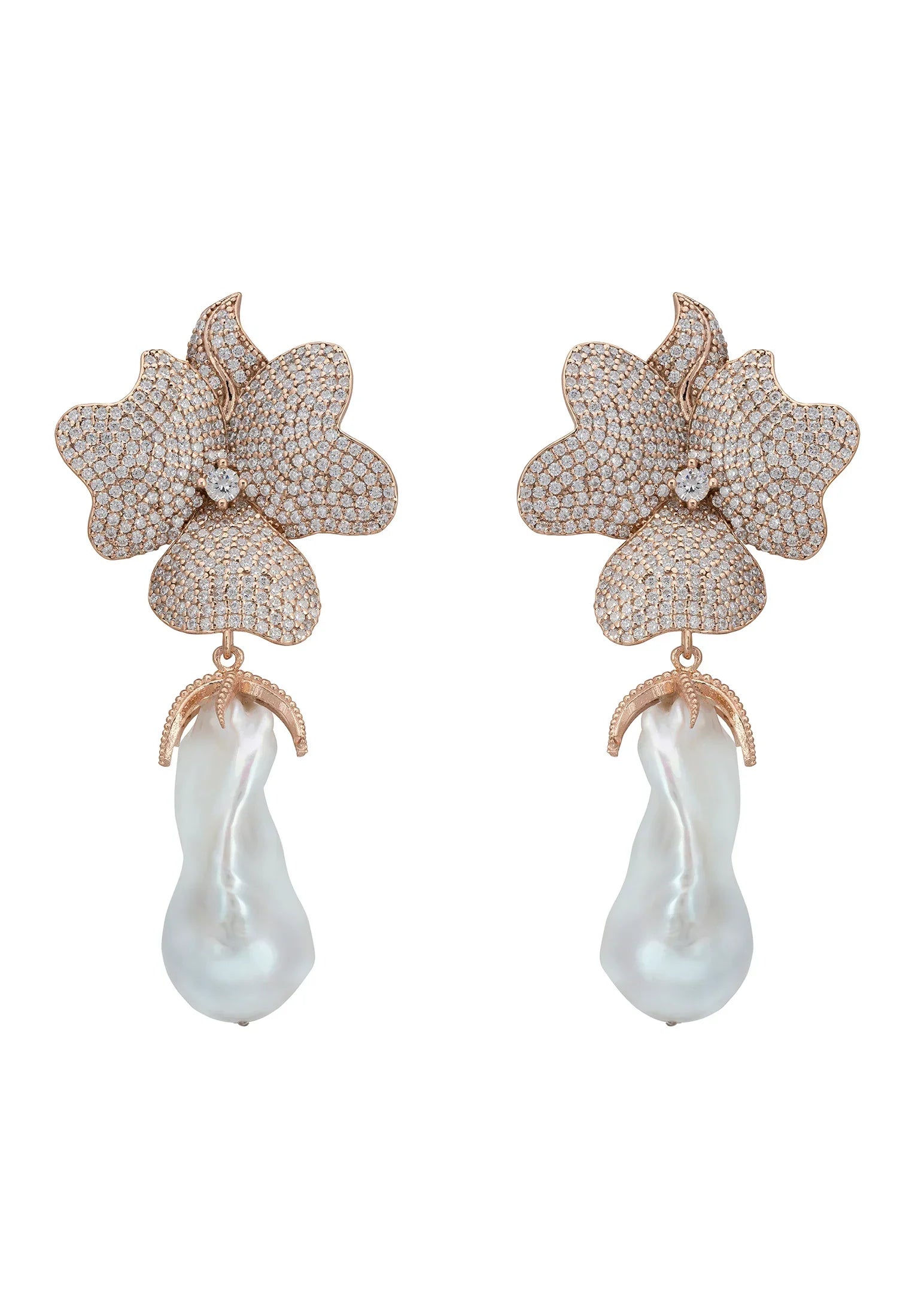 Large pearl and rose gold flower earrings.