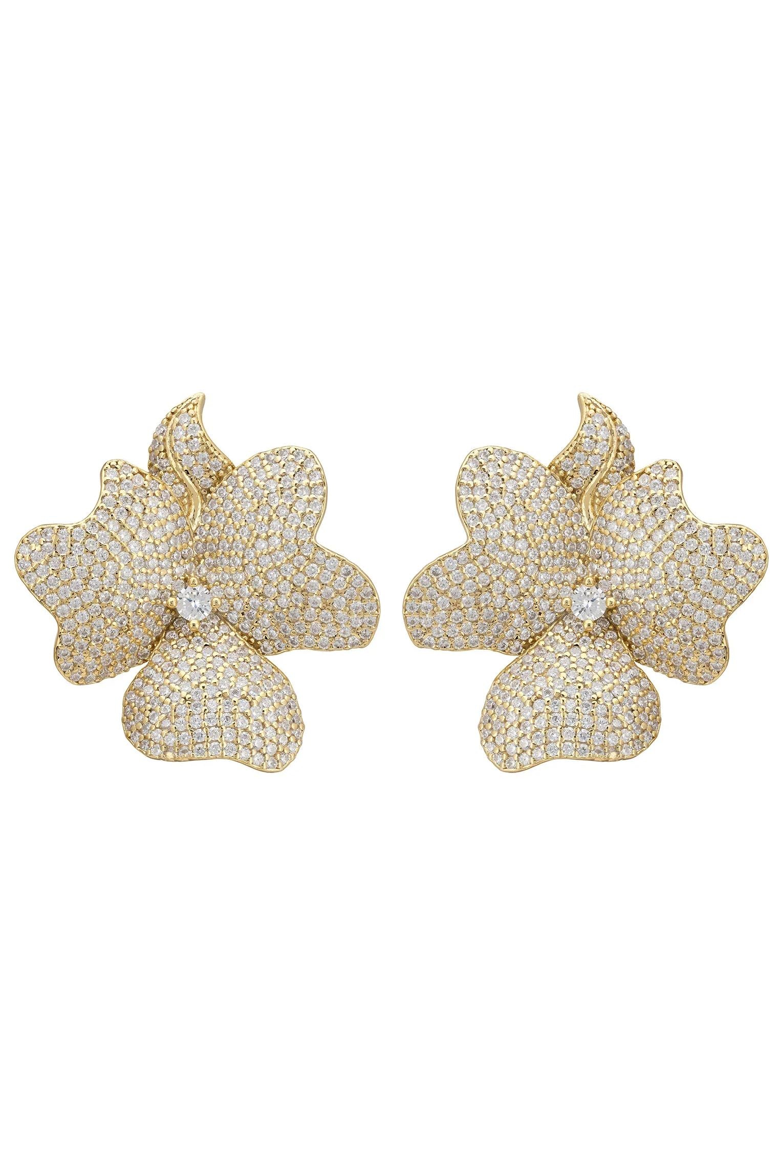 Diamond and gold flower large stud earrings.
