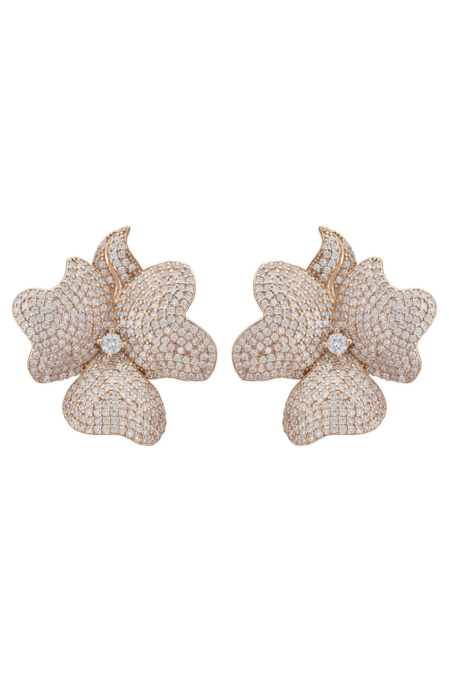 Diamond and rose gold flower large stud earrings.