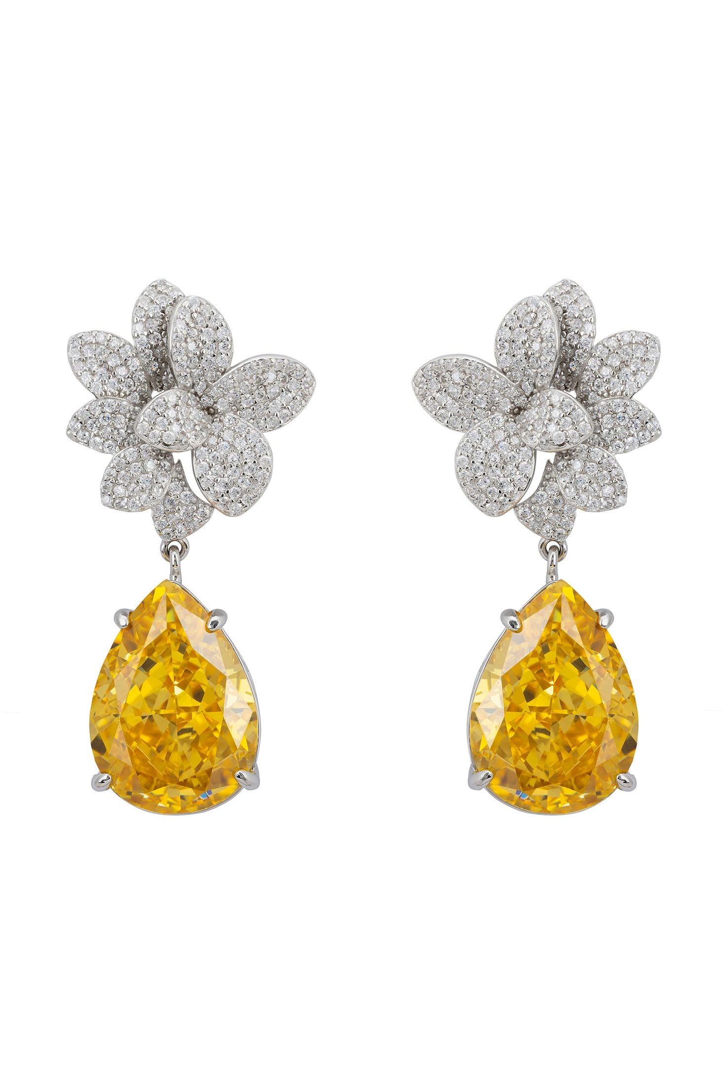 Teardrop yellow gemstone and diamond flower drop earrings.