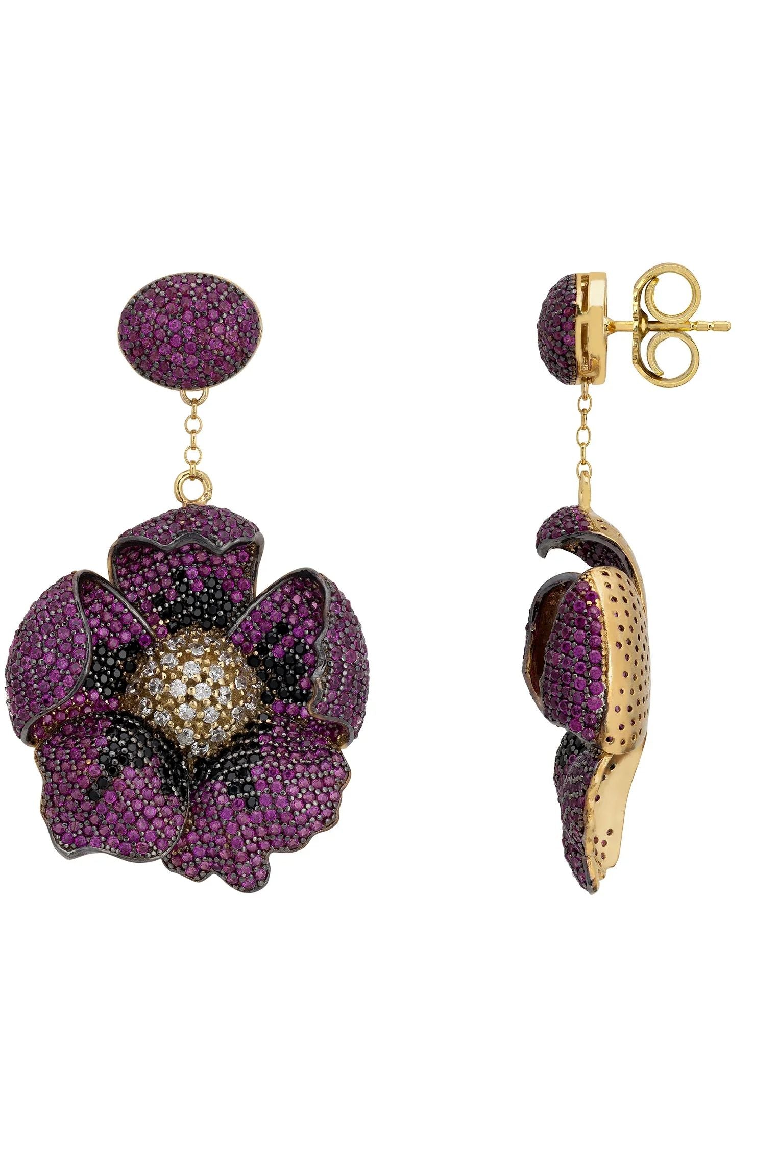 Push backing of the earrings.