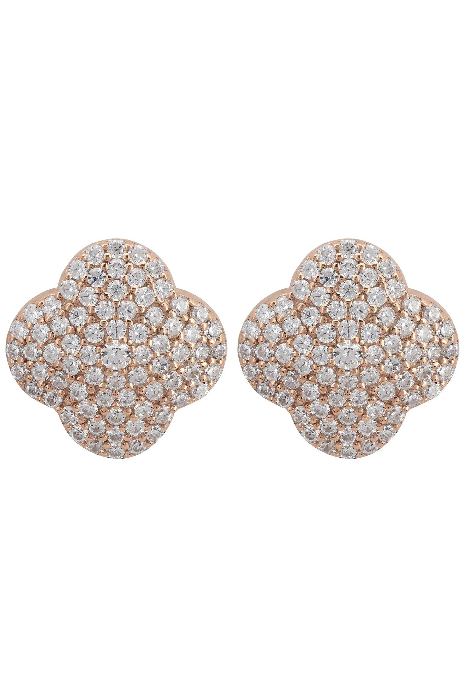 Diamond and rose gold clover stud earrings.